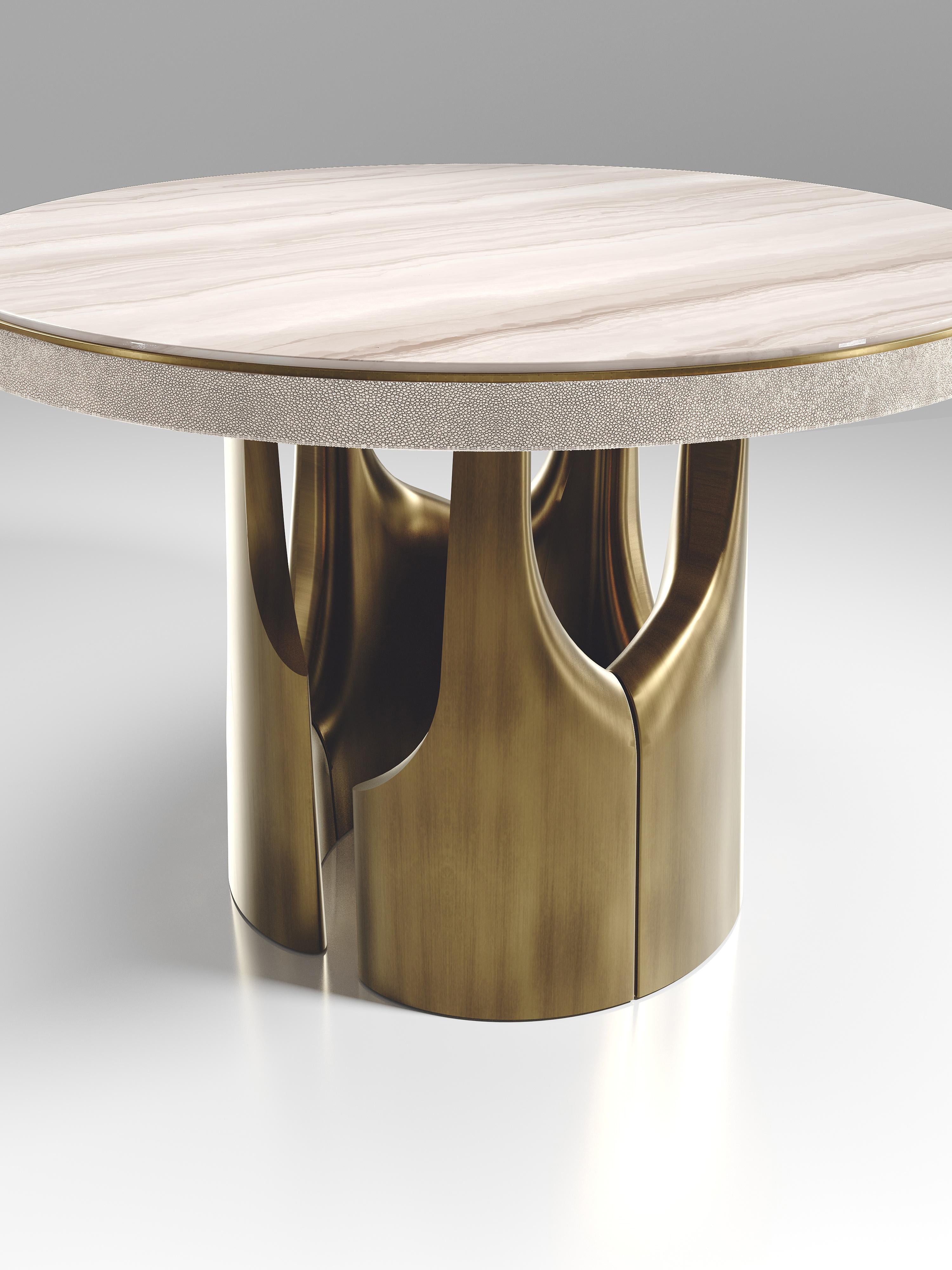 https://a.1stdibscdn.com/shell-dining-table-with-bronze-patina-brass-accents-by-ry-augousti-for-sale-picture-15/f_45491/f_333802821679290757988/BT10_BRG_STN9_D1_2__master.jpeg