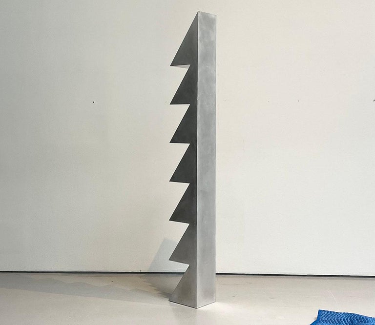 https://a.1stdibscdn.com/1234567-aluminum-bookshelf-by-clay-brown-for-sale-picture-2/f_37133/f_437856321740428310871/Backside_master.jpg?width=768