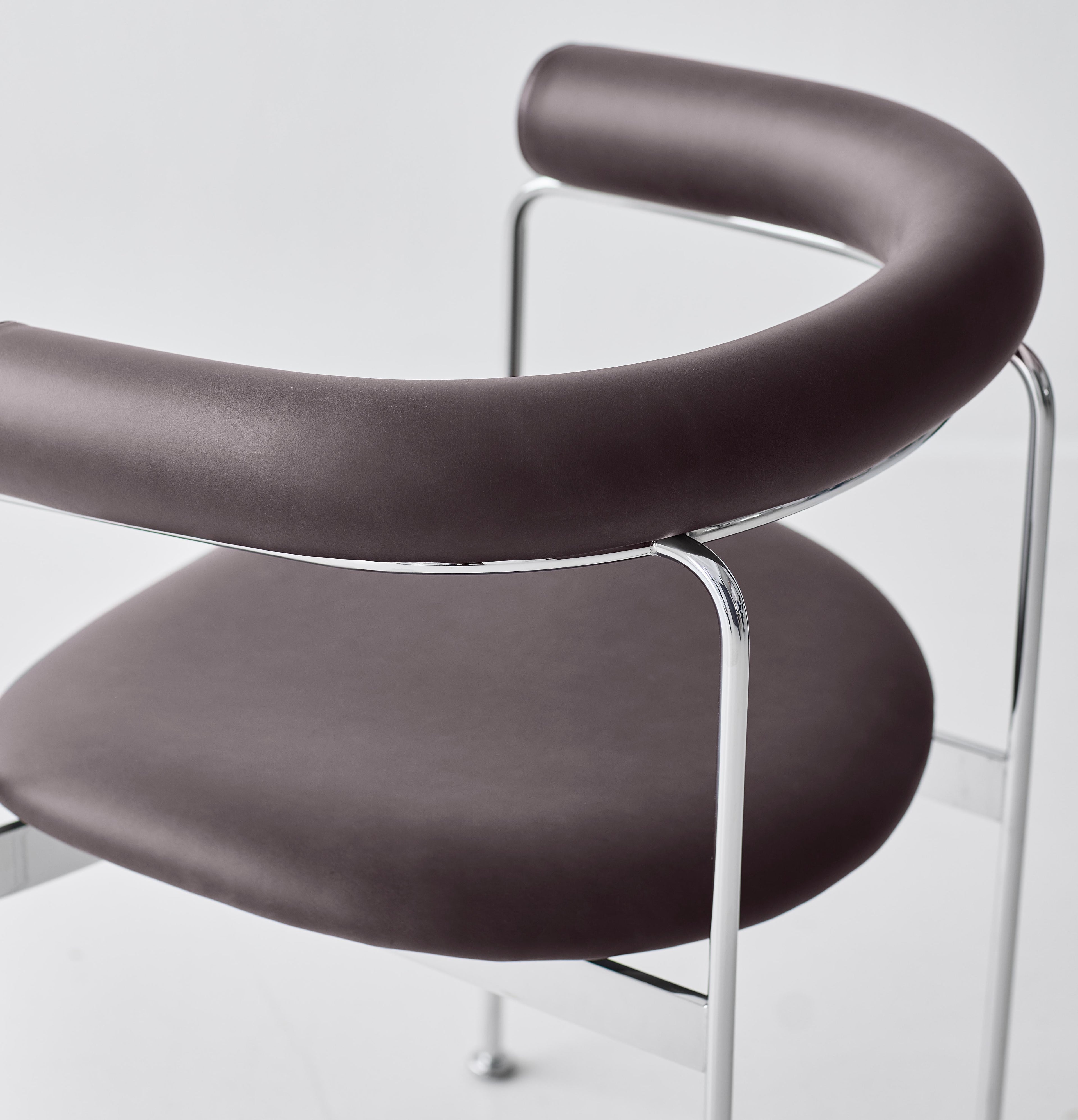 https://a.1stdibscdn.com/contemporary-chair-baia-by-kensaku-oshiro-x-dk3-chrome-frame-black-leather-for-sale-picture-5/f_31233/f_434451521738575830677/Baia_Collection_057_master.jpeg