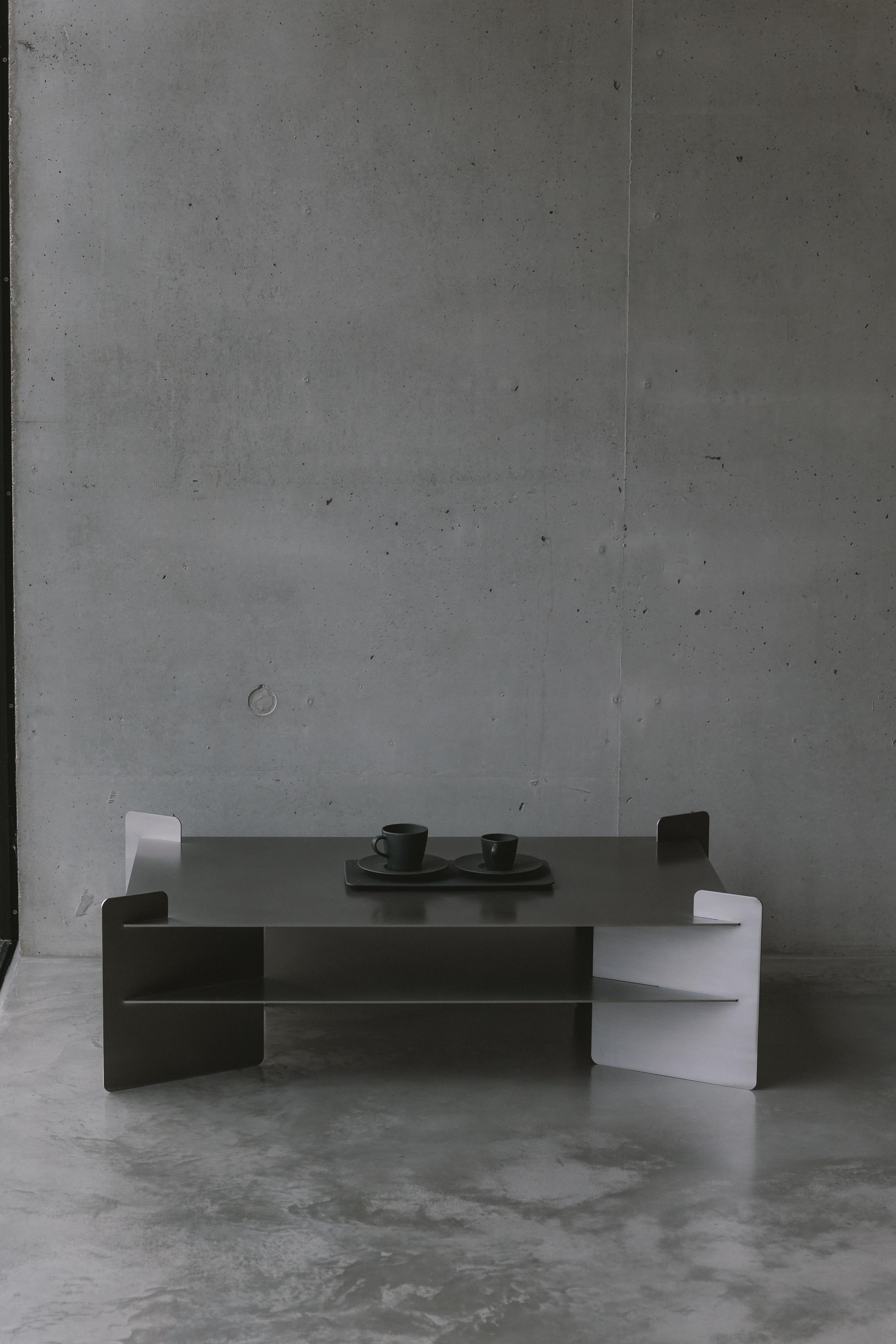 https://a.1stdibscdn.com/bali-stainless-steel-coffee-table-by-zincutec-for-sale-picture-6/f_12192/f_486226321770058832199/Bali_Coffee_Table_front__master.jpg