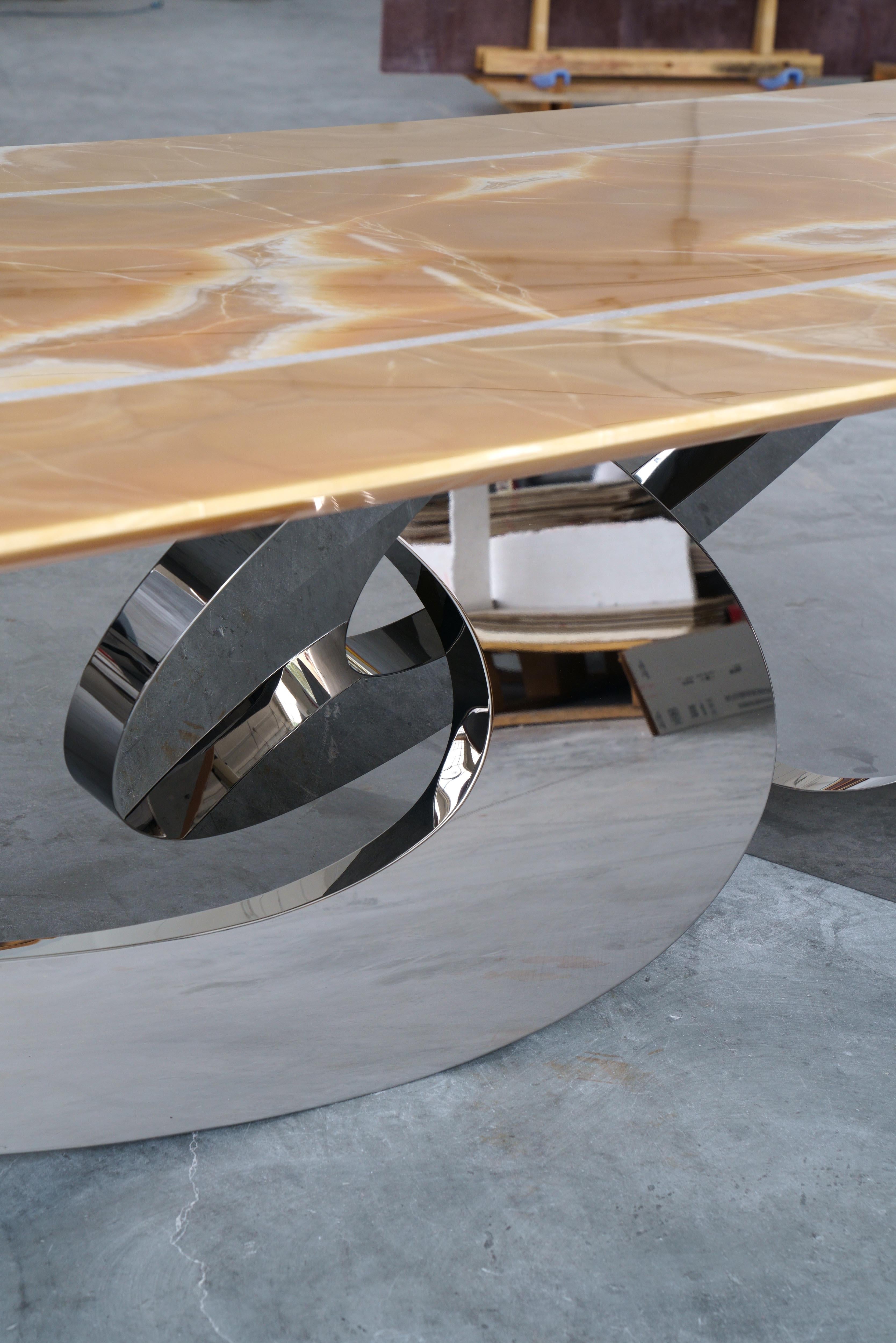https://a.1stdibscdn.com/dining-table-orange-onyx-sculpture-mirror-steel-white-marble-inlay-made-in-italy-for-sale-picture-3/f_22003/f_321511221673366198009/Bangles_Stone_Orange_Onyx_Barberini_and_Gunnell_03_master.jpg