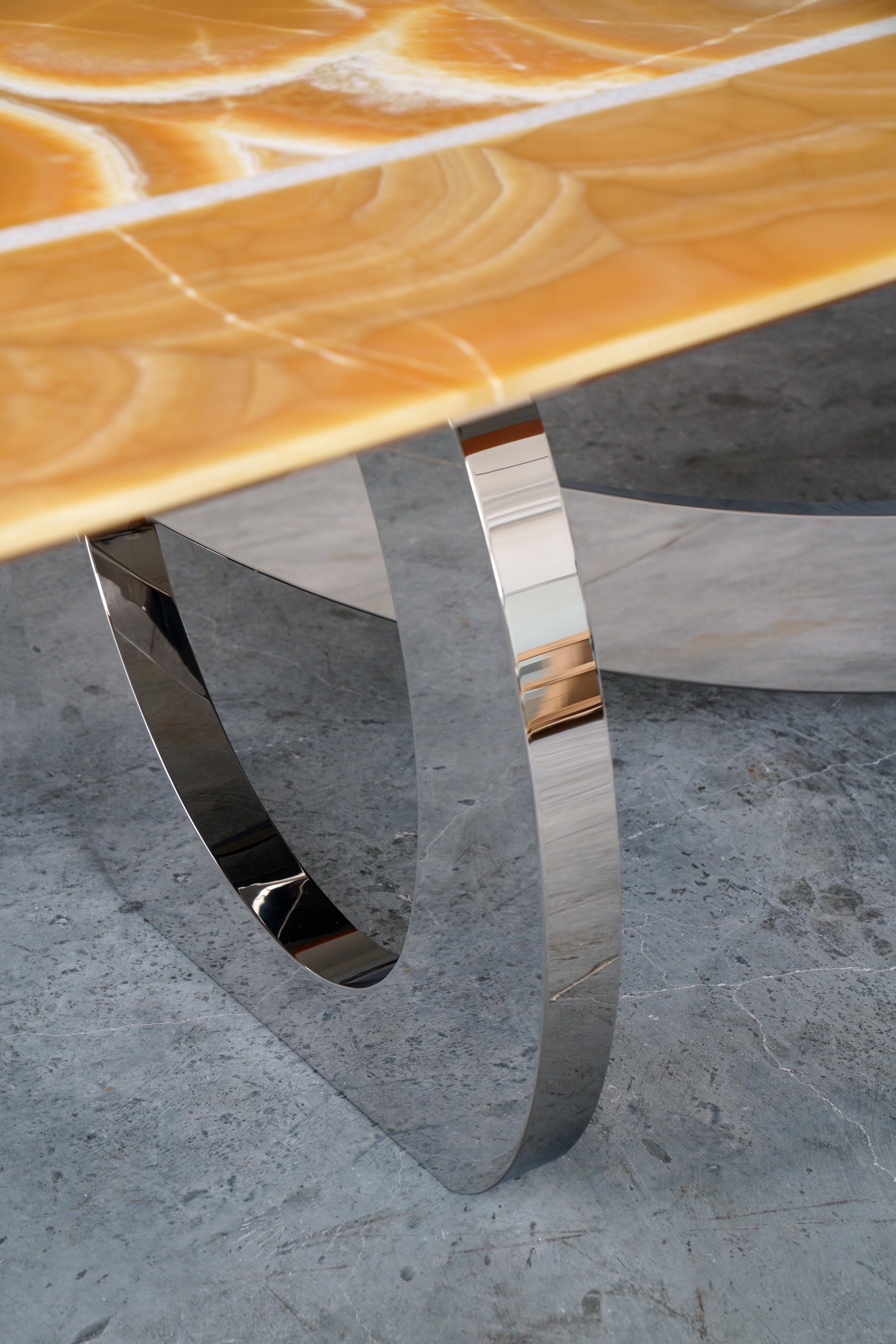 https://a.1stdibscdn.com/dining-table-orange-onyx-sculpture-mirror-steel-white-marble-inlay-made-in-italy-for-sale-picture-8/f_22003/f_321511221673366202431/Bangles_Stone_Orange_Onyx_Barberini_and_Gunnell_08_master.jpg