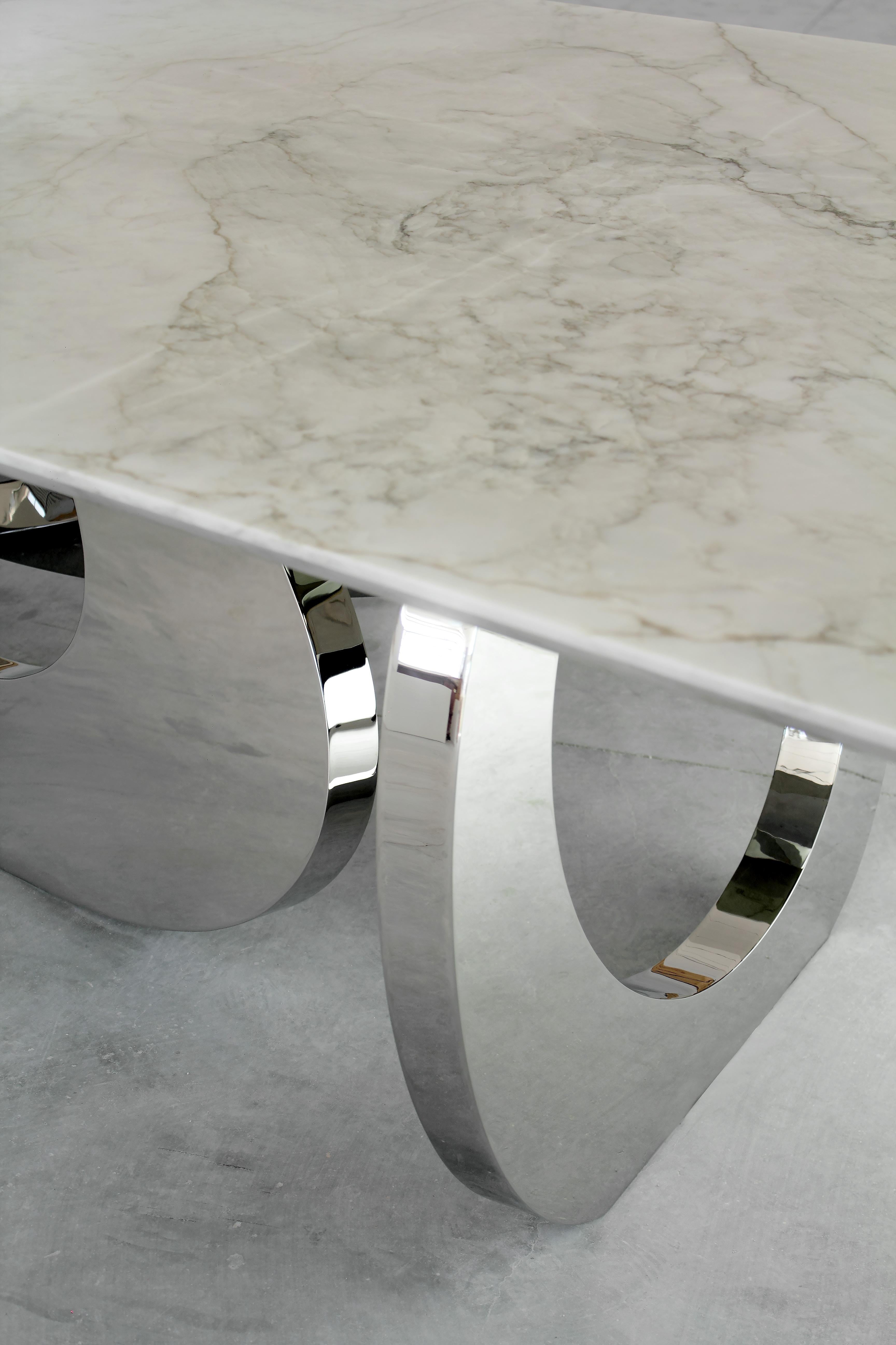 https://a.1stdibscdn.com/dining-table-rectangular-white-marble-top-mirror-steel-base-custom-design-italy-for-sale-picture-9/f_22003/f_132593811688551519108/Bangles_Stone_detail_2_Barberini_and_Gunnell_master.jpg