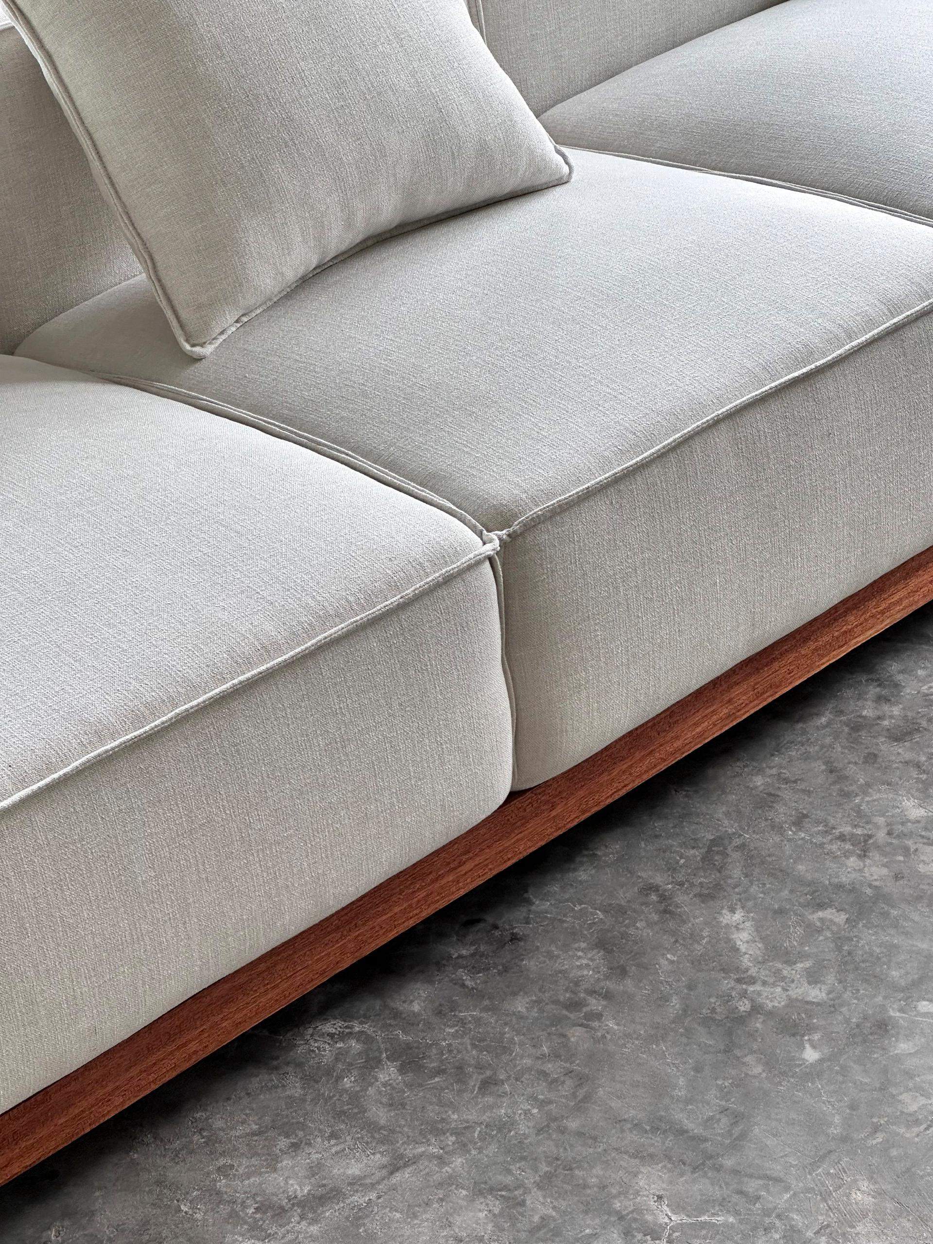 https://a.1stdibscdn.com/oak-and-walnut-banh-chung-sofa-by-onon-details-for-sale-picture-8/f_12192/f_466845821758037470965/Banh_Chung_Sofa_Supportive_6_master.jpg