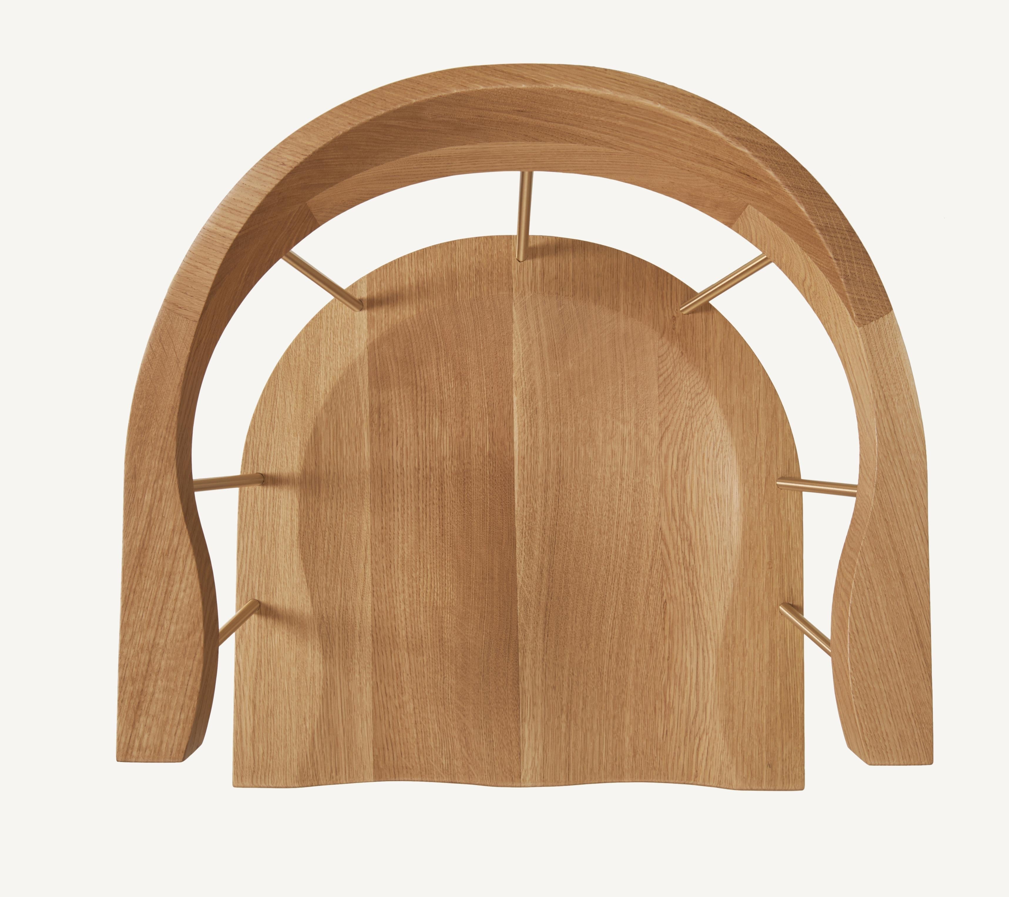 https://a.1stdibscdn.com/spindle-chair-in-solid-carved-white-oak-and-steel-designed-by-craig-bassam-for-sale-picture-6/f_55842/1612262026495/BassamFellows_CB_28S_Spindle_Chair_solid_White_Oak_and_Satin_Brass_bird_s_eye_credit_MARCO_FAVALI_master.jpg