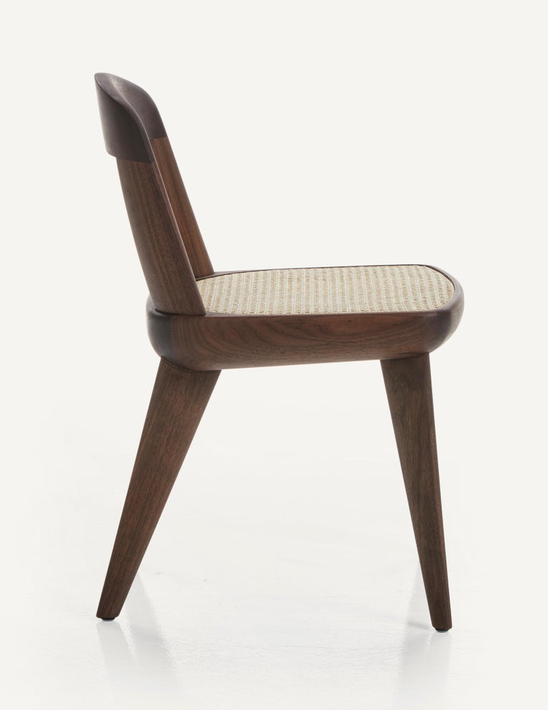 https://a.1stdibscdn.com/brutus-armless-chair-in-solid-wood-with-cane-seat-designed-by-craig-bassam-for-sale-picture-5/f_55842/1612261482224/BassamFellows_CB_47_Brutus_Armless_Chair_in_Walnut_Black_Oil_with_Vienna_Caning_profile_Photogaphy_MARCO_FAVALI_master.jpg?width=768