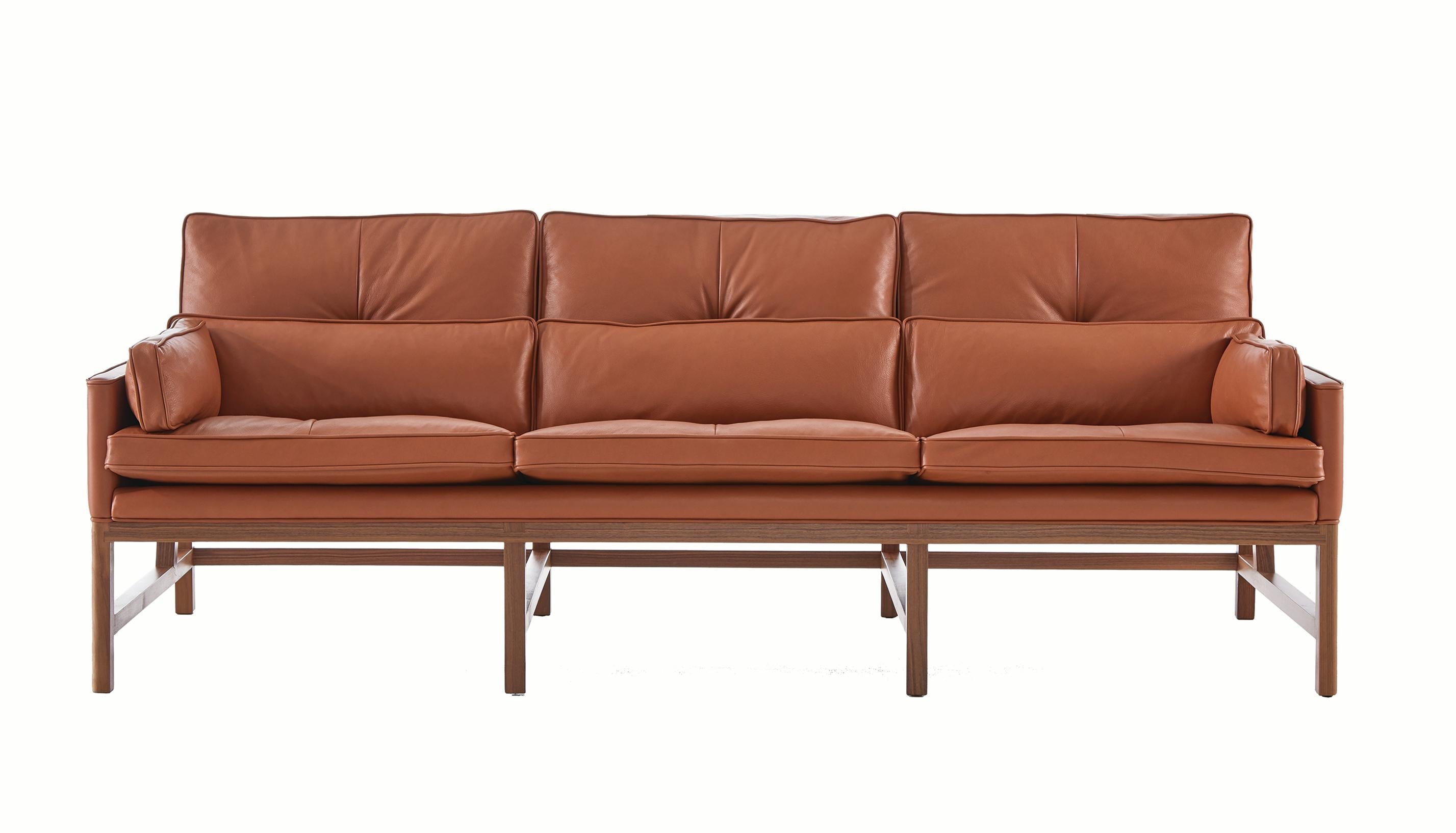 https://a.1stdibscdn.com/wood-frame-low-back-sofa-in-walnut-and-leather-designed-by-craig-bassam-for-sale/f_55842/1612821839460/BassamFellows_CB_53_Wood_Frame_Sofa_solid_Walnut_and_Grade_A_leather_British_Tan_front_photo_credit_MARCO_FAVAL_master.jpg