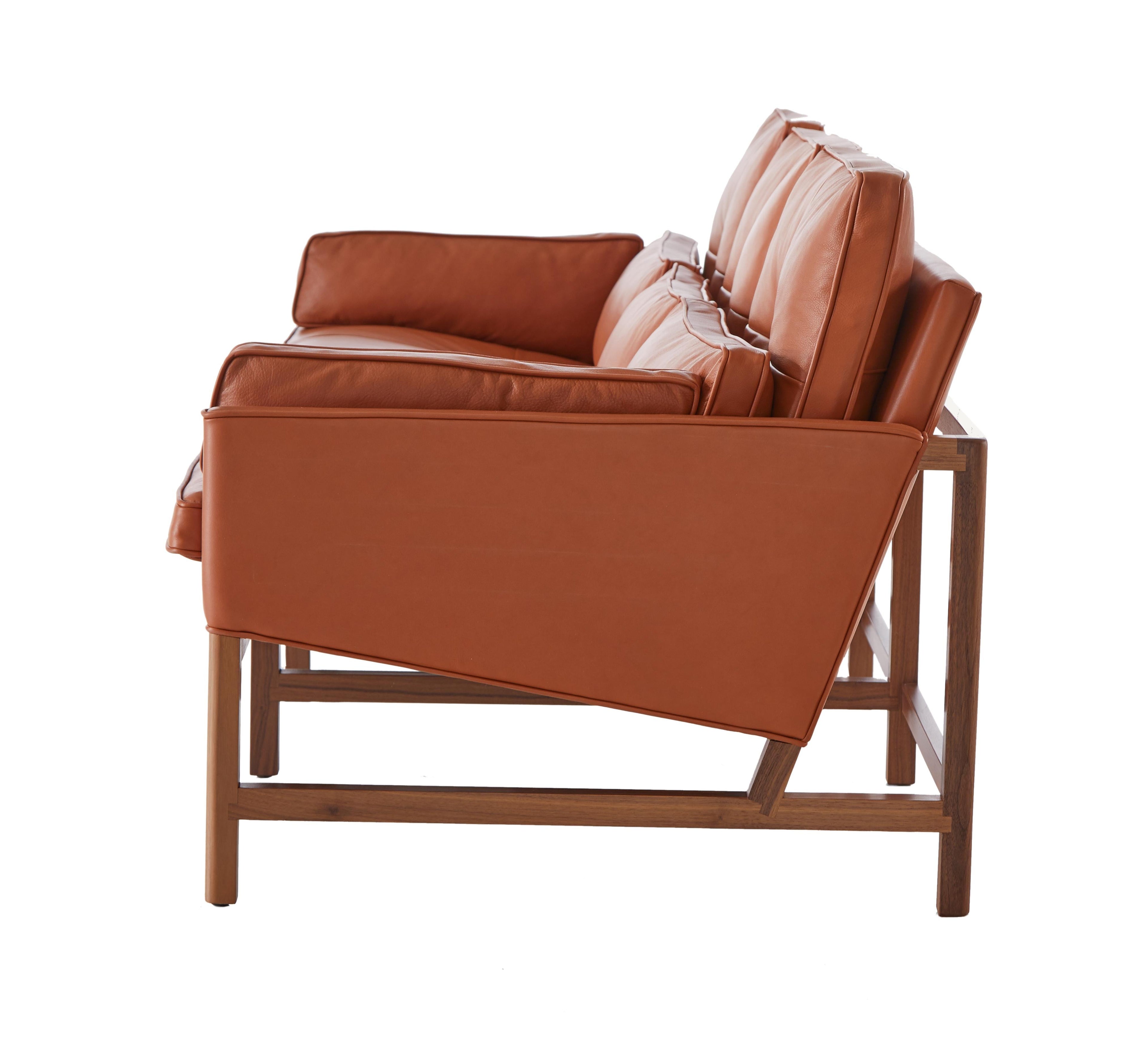 https://a.1stdibscdn.com/archivesE/upload/f_55842/1612821886535/BassamFellows_CB_53_Wood_Frame_Sofa_solid_Walnut_and_Grade_A_leather_British_Tan_profile_photo_credit_MARCO_FAVALI_master.jpg