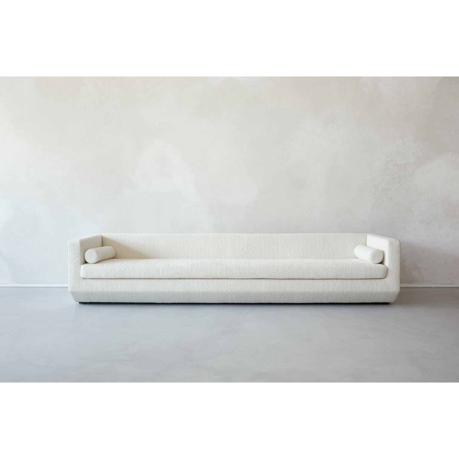 https://a.1stdibscdn.com/large-beveled-couch-by-marc-dibeh-for-sale-picture-2/f_12192/f_335250521680013421082/Beveled_Couch_master.jpg