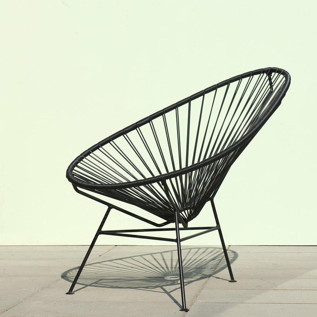 https://a.1stdibscdn.com/black-acapulco-chair-by-ok-design-for-sale-picture-2/f_12192/f_414526421726176747191/Black_Acapulco_chair_1_master.jpg