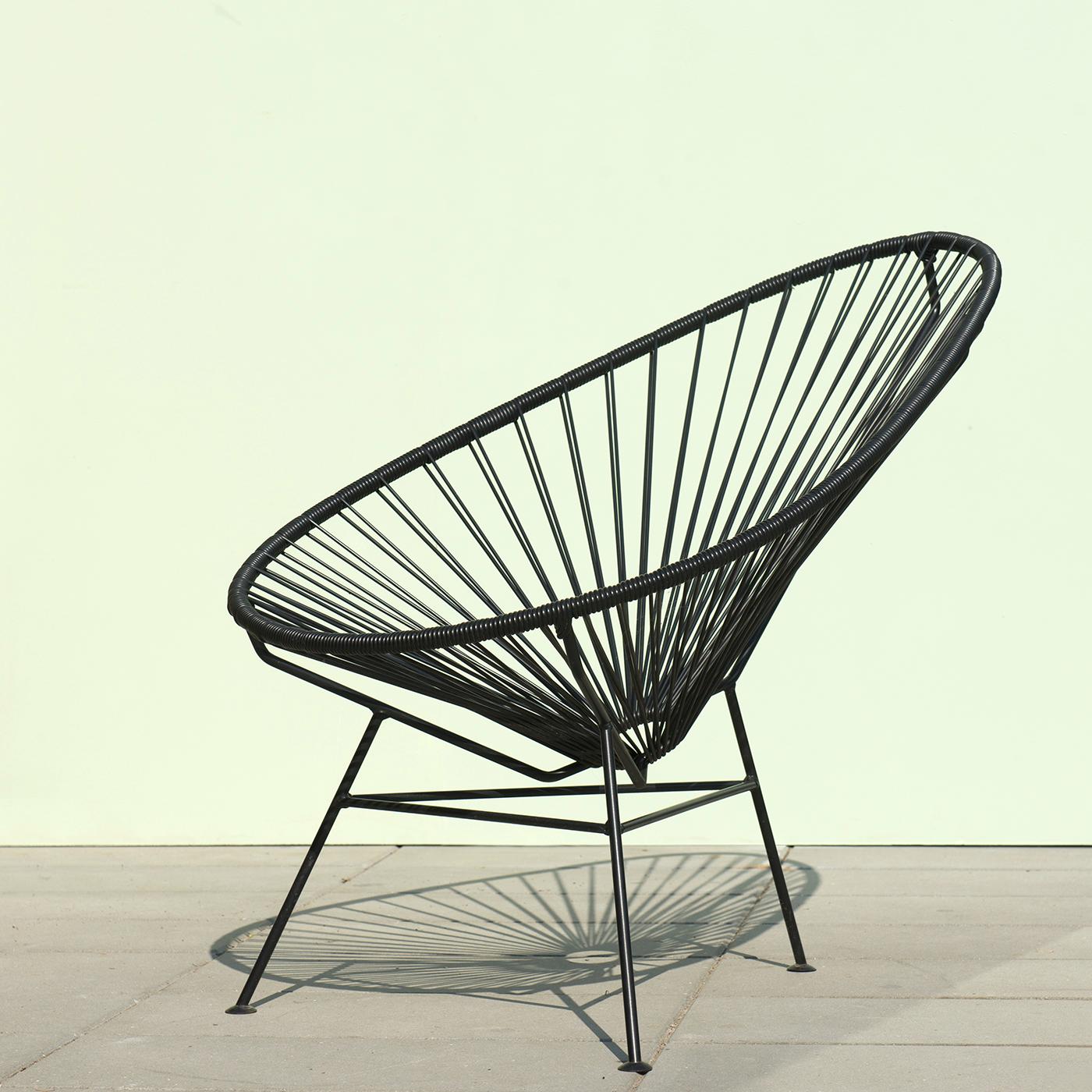 https://a.1stdibscdn.com/black-acapulco-chair-by-ok-design-for-sale-picture-2/f_12192/f_414526421726176747191/Black_Acapulco_chair_1_master.jpg