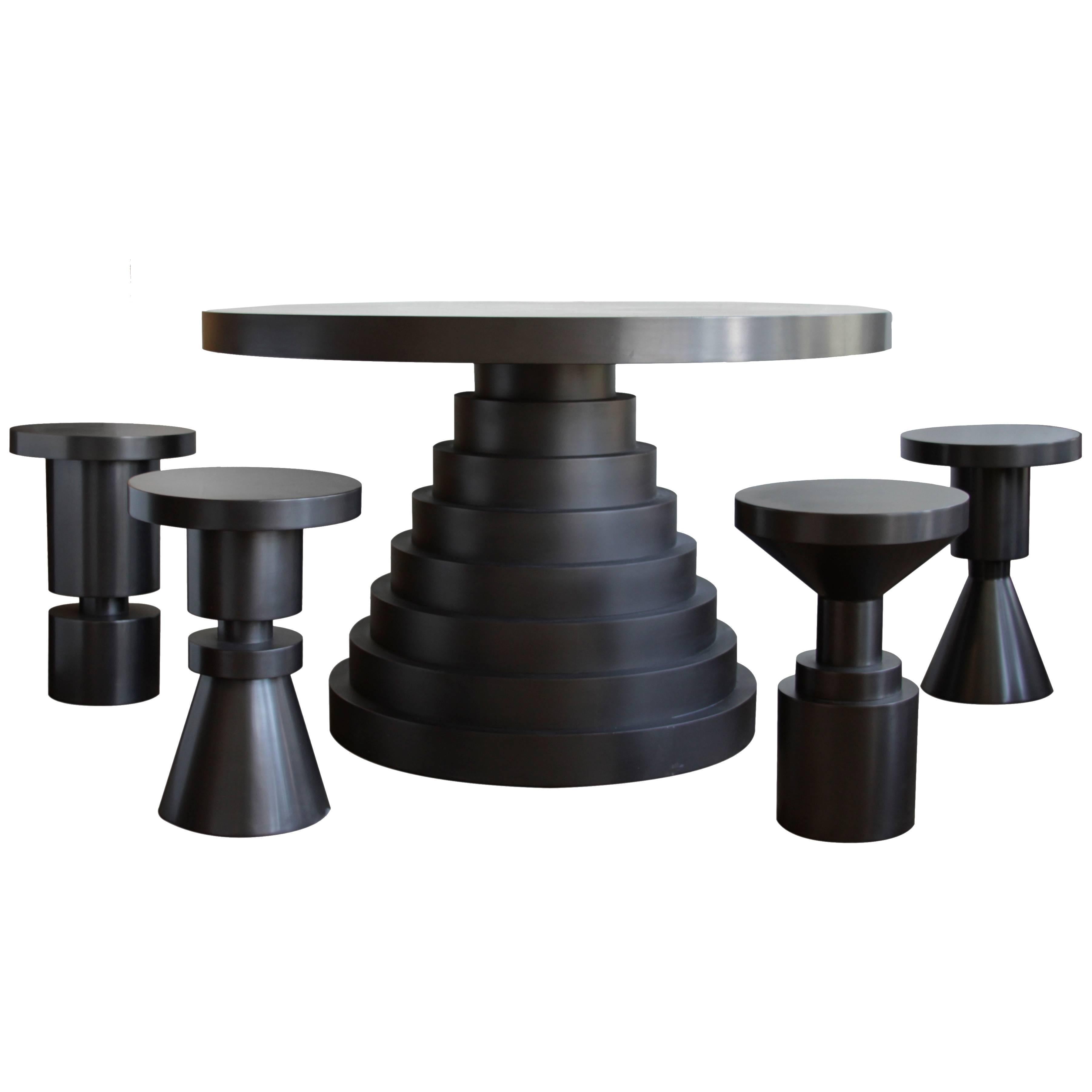 https://a.1stdibscdn.com/archivesE/upload/3663232/f_49156631465940834563/Black_Satin_Layered_Dining_Table_org_master.jpg