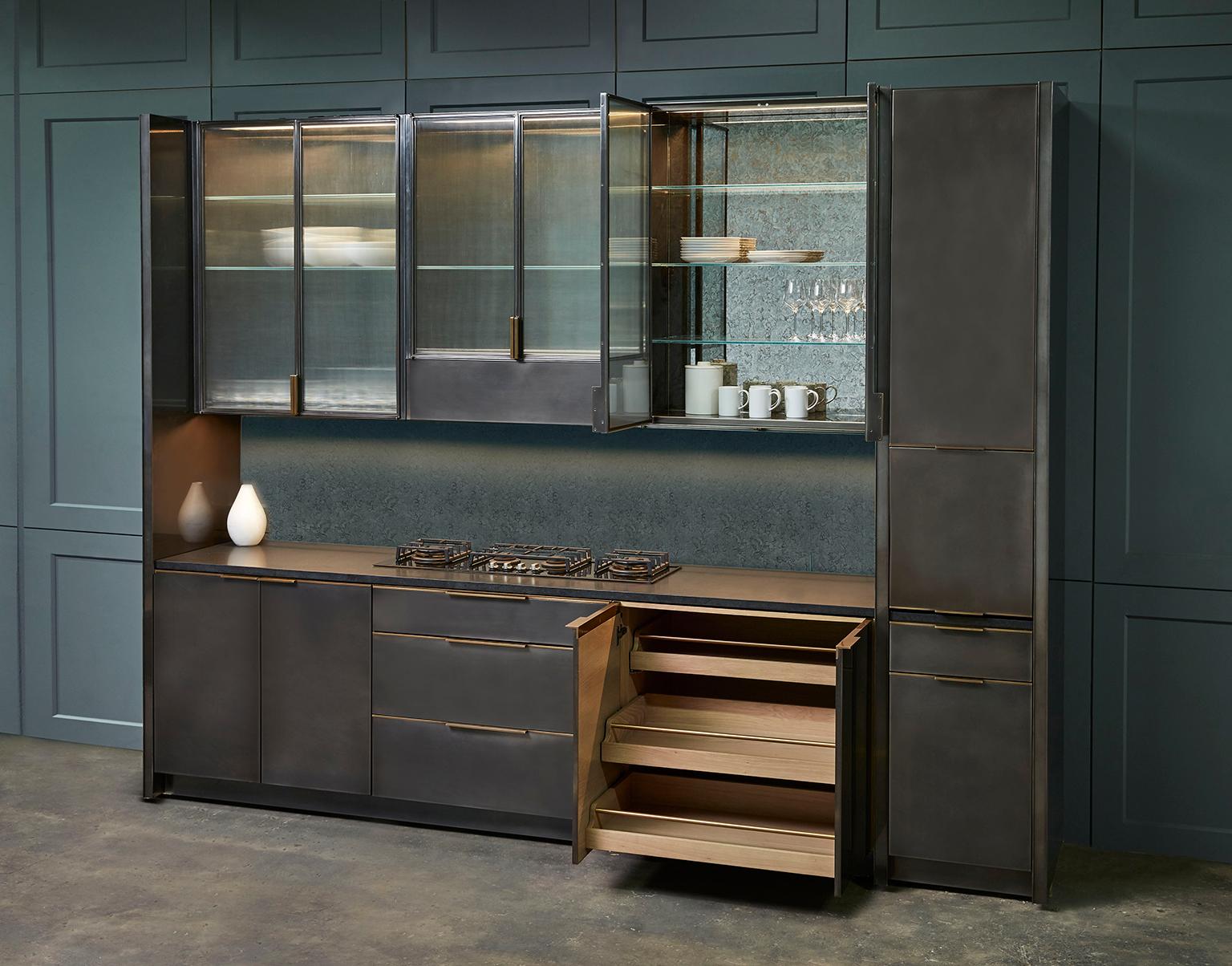 https://a.1stdibscdn.com/amuneals-gunmetal-kitchen-for-sale-picture-2/f_28333/f_128603321543589373593/Blackened_Steel_Kitchen_Full_Angled_Styled_multiple_doors_open_2_Ammuneal_6_22_1712422_master.jpg
