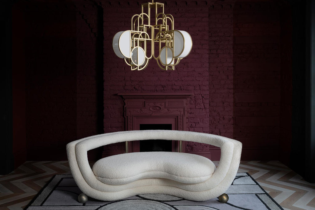 https://a.1stdibscdn.com/sculptural-kissing-sofa-by-lara-bohinc-in-bronze-metal-and-cream-boucle-in-stock-for-sale-picture-4/f_19173/f_254440821681991924461/Bohinc_Studio_Kissing_Sofa_and_Moonrise_Chandelier_photo_by_R_Reid_master.jpg