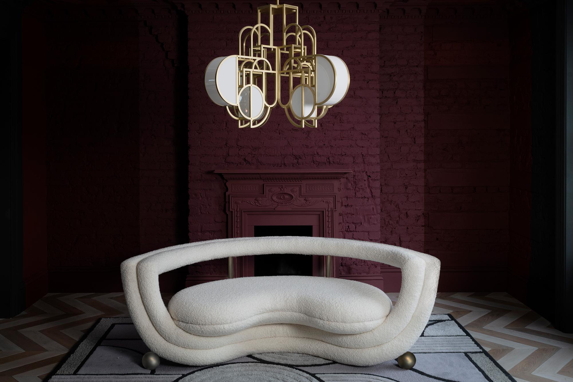 https://a.1stdibscdn.com/sculptural-kissing-sofa-by-lara-bohinc-in-bronze-metal-and-cream-boucle-in-stock-for-sale-picture-4/f_19173/f_254440821681991924461/Bohinc_Studio_Kissing_Sofa_and_Moonrise_Chandelier_photo_by_R_Reid_master.jpg