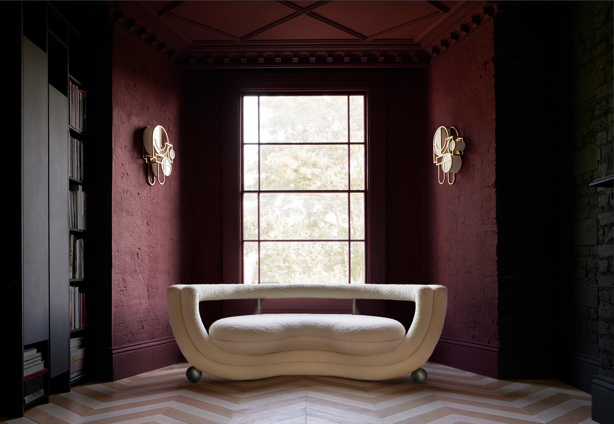 https://a.1stdibscdn.com/sculptural-kissing-sofa-by-lara-bohinc-in-bronze-metal-and-pink-boucle-in-stock-for-sale-picture-5/f_19173/f_329275921681991848892/Bohinc_Studio_Kissing_Sofa_and_Moonrise_Wall_Lights_photo_by_P_Fragni_re_master.jpg