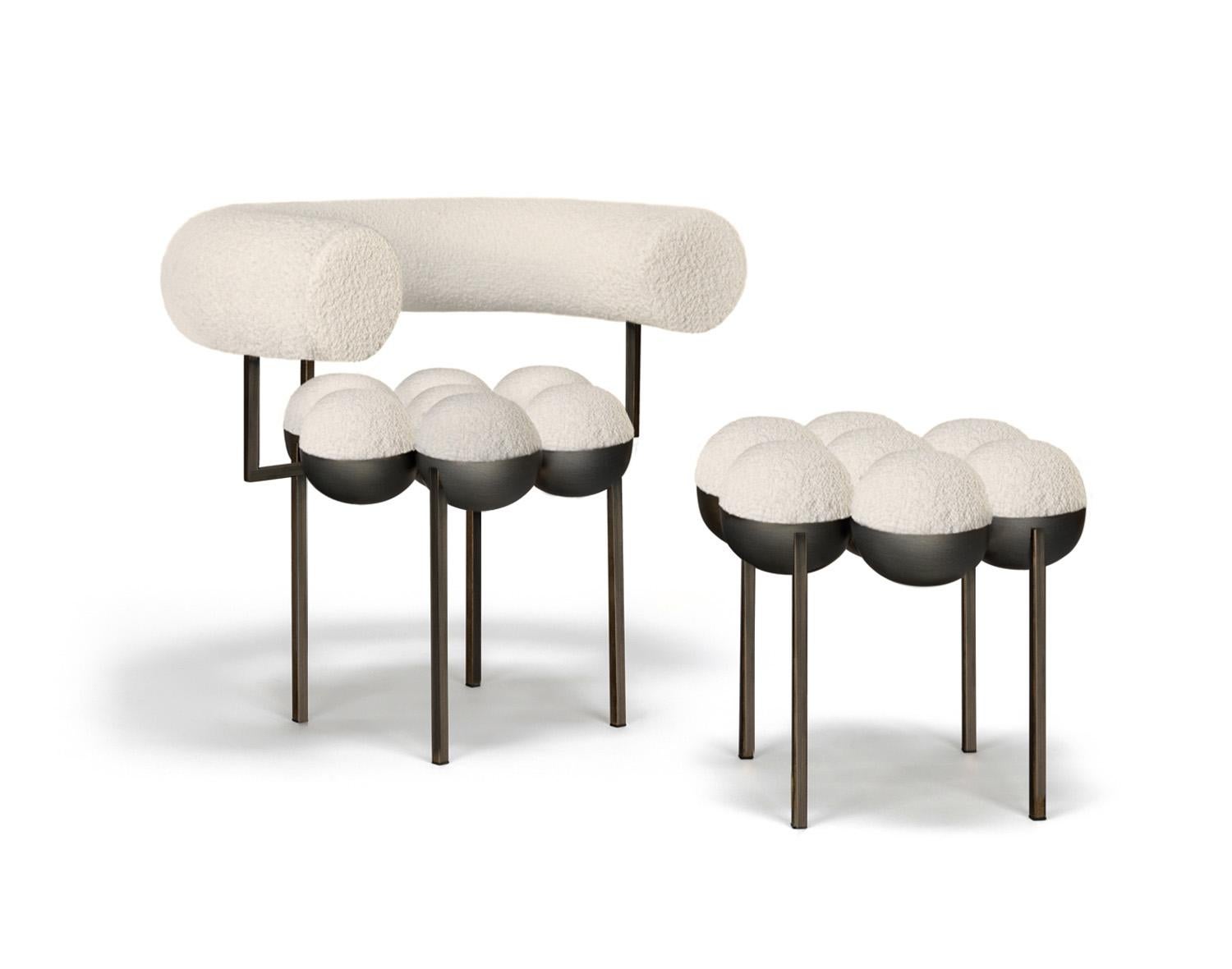 https://a.1stdibscdn.com/saturn-chair-bronze-oxidized-steel-and-cream-boucle-wool-by-lara-bohinc-in-stock-for-sale-picture-4/f_19173/f_220904821681992701012/Bohinc_Studio_Saturn_Chair_and_Saturn_Small_Pouffe_new_master.jpg
