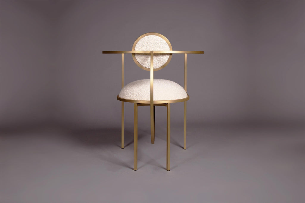 https://a.1stdibscdn.com/lunar-chair-in-cream-boucle-wool-fabric-and-brushed-brass-by-lara-bohinc-for-sale-picture-6/f_19173/f_220909721643113420778/Bohince_Studio_Lunar_Chair_Cream_Boucle_Back_on_grey_master.jpg