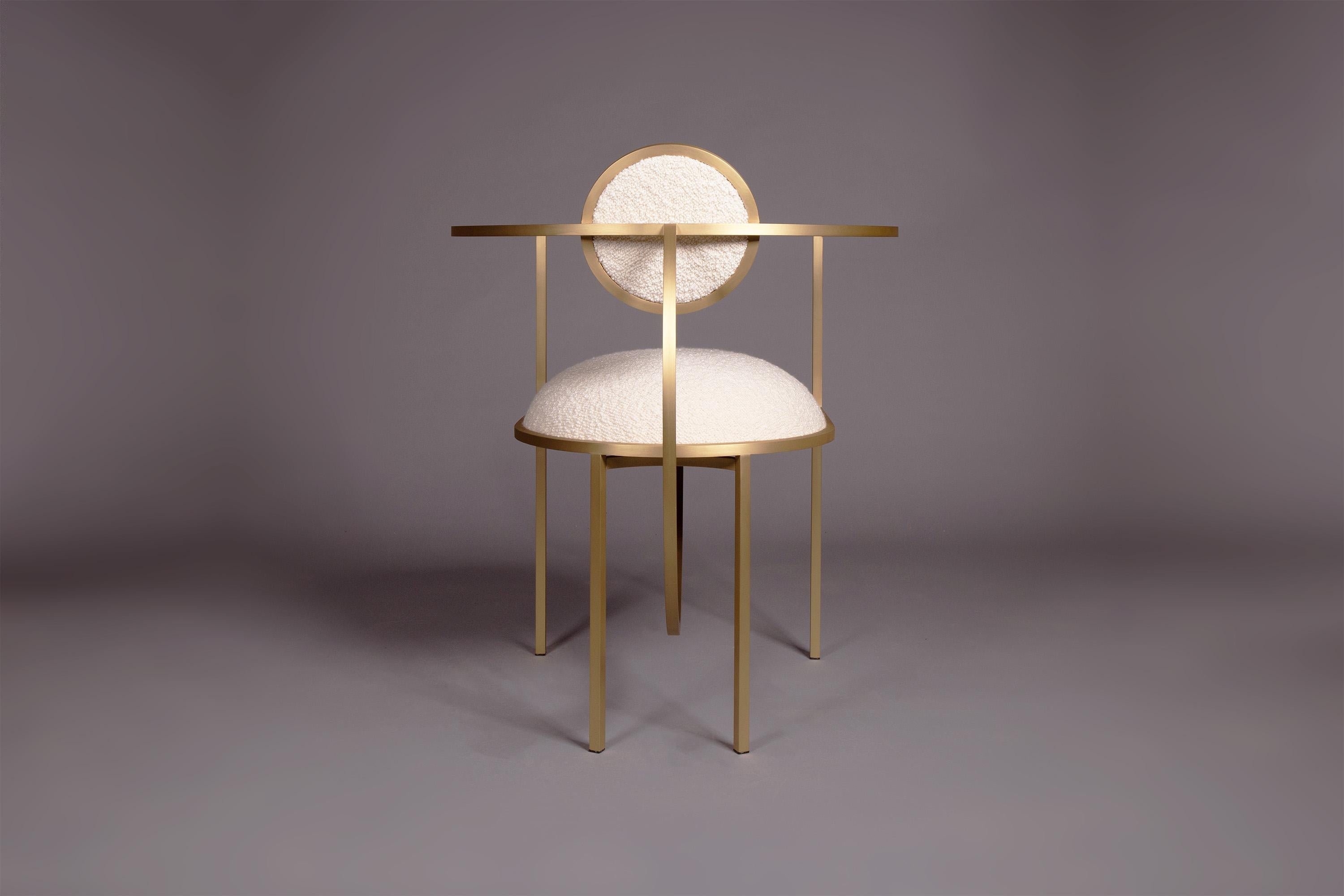 https://a.1stdibscdn.com/lunar-chair-in-cream-boucle-wool-fabric-and-brushed-brass-by-lara-bohinc-for-sale-picture-6/f_19173/f_220909721643113420778/Bohince_Studio_Lunar_Chair_Cream_Boucle_Back_on_grey_master.jpg