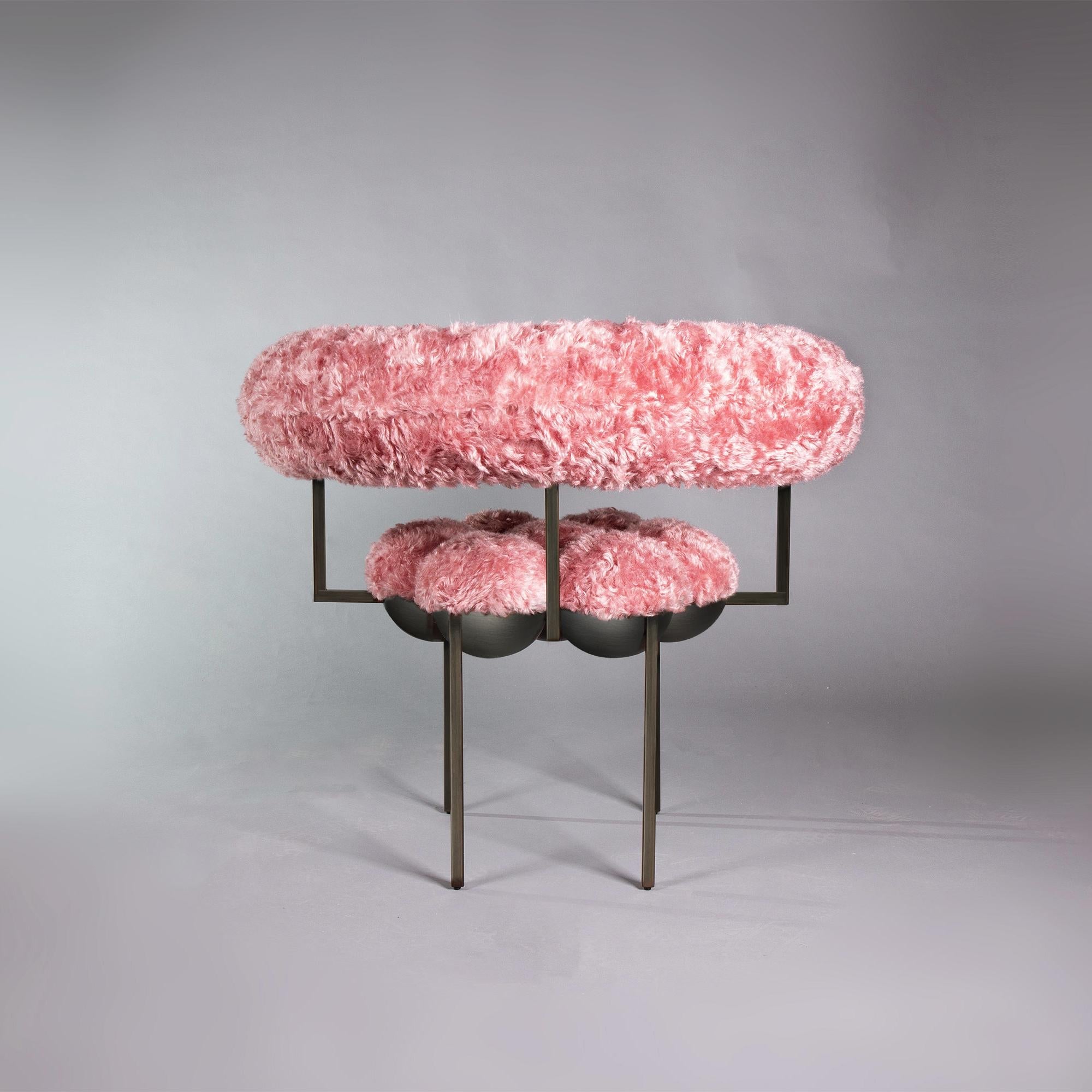 https://a.1stdibscdn.com/saturn-chair-furry-pink-fabric-by-lara-bohinc-in-stock-for-sale-picture-4/f_19173/f_242482321681992593949/Bohince_Studio_Saturn_Chair_Furry_Pink_Back_on_grey_master.jpg