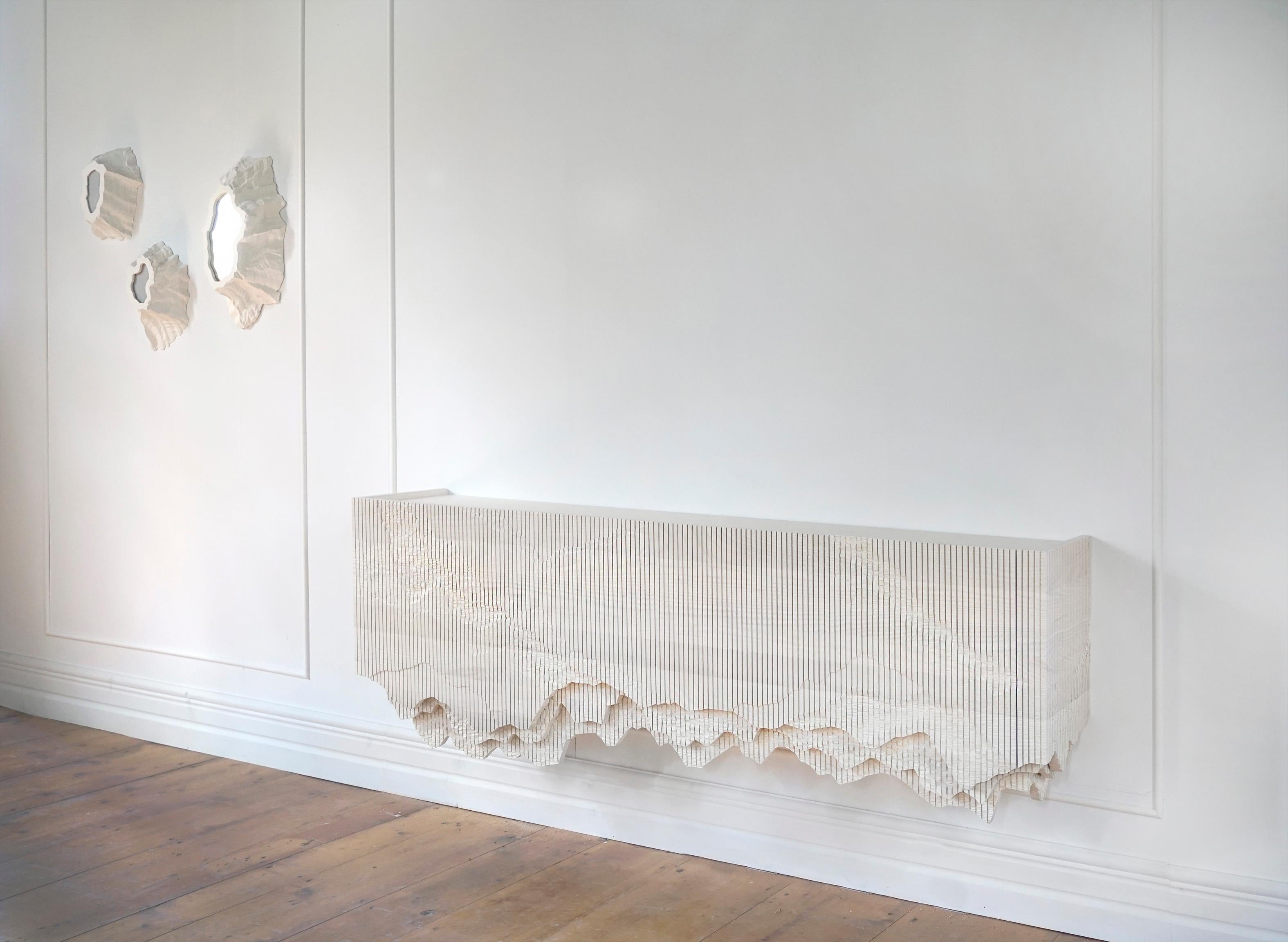 https://a.1stdibscdn.com/ledge-floating-console-73-in-bone-white-by-simon-johns-for-sale-picture-3/f_26473/f_346936721686334945543/Bone_white_ledge_73_angle_2_LO_master.jpg