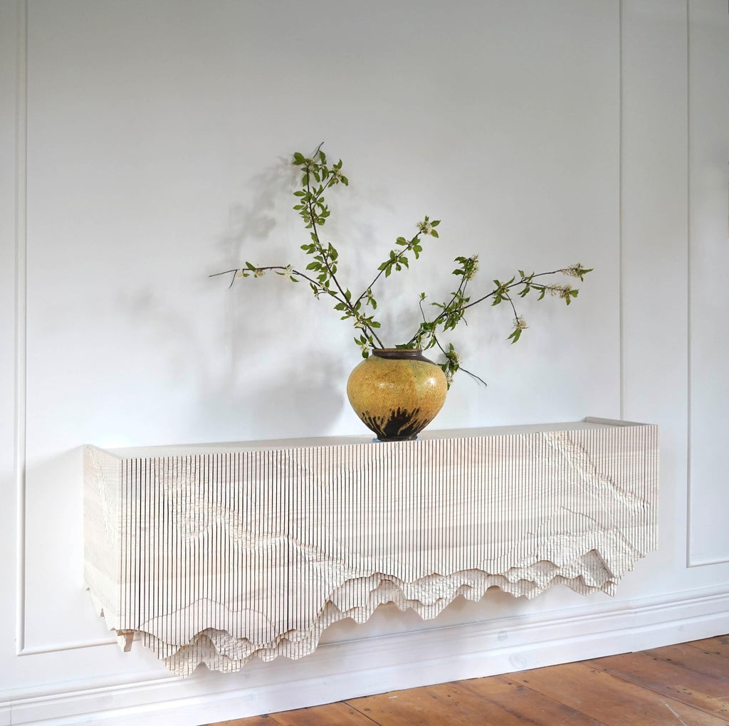 https://a.1stdibscdn.com/ledge-floating-console-73-in-bone-white-by-simon-johns-for-sale-picture-7/f_26473/f_346936721686335049055/Bone_white_ledge_73_angle_IG_master.jpg