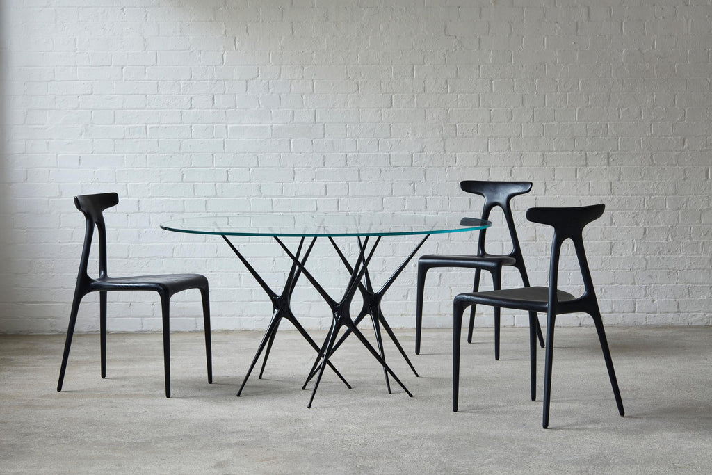 https://a.1stdibscdn.com/supernova-recycled-cast-aluminum-table-leg-in-black-by-made-in-ratio-for-sale-picture-6/f_36441/f_162622411659608142947/Brodie_Neill_Stellarnova_Alpha_Mark_Cocksedge_master.jpg