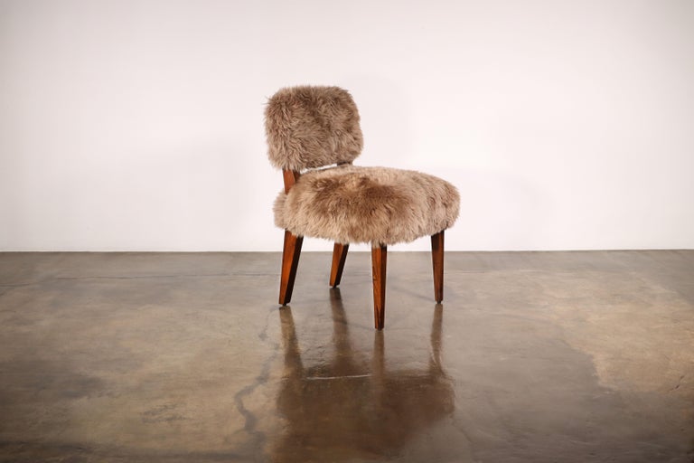 https://a.1stdibscdn.com/modern-dining-chair-in-exotic-wood-and-sheepskin-from-costantini-bruno-ovino-for-sale-picture-2/f_25173/f_323976021674588696695/Bruno_Ovino_by_Costantini_00_master.jpg?width=768