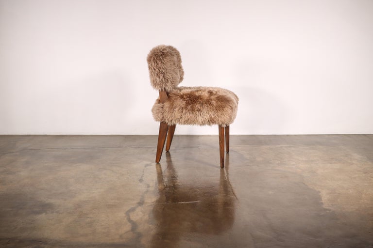https://a.1stdibscdn.com/modern-dining-chair-in-exotic-wood-and-sheepskin-from-costantini-bruno-ovino-for-sale-picture-5/f_25173/f_323976021674588774019/Bruno_Ovino_by_Costantini_03_master.jpg?width=768