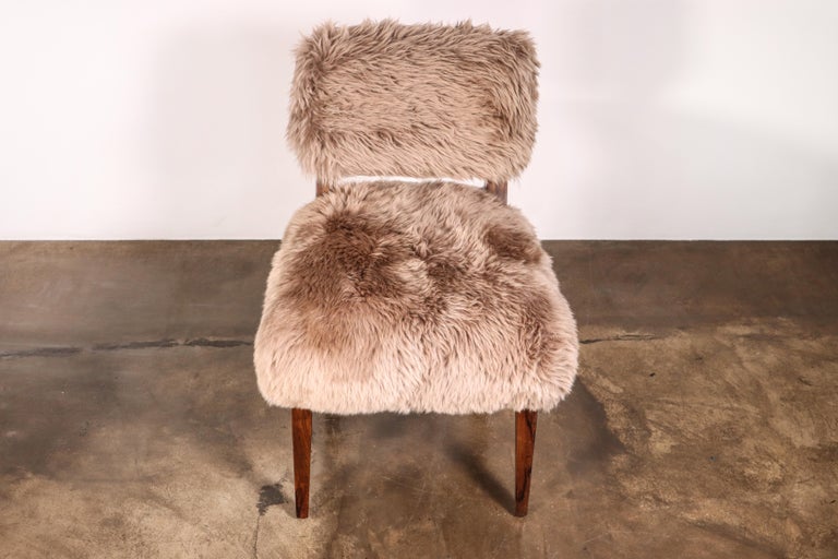 https://a.1stdibscdn.com/modern-dining-chair-in-exotic-wood-and-sheepskin-from-costantini-bruno-ovino-for-sale-picture-6/f_25173/f_323976021674588784199/Bruno_Ovino_by_Costantini_04_master.jpg?width=768