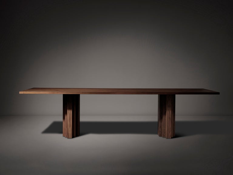 https://a.1stdibscdn.com/minimalist-solid-oak-wooden-brut-slim-dining-table-for-sale-picture-12/f_89302/f_352861721726488138429/Brut_Slim_Am_walnut_front_view_master.jpeg?width=768