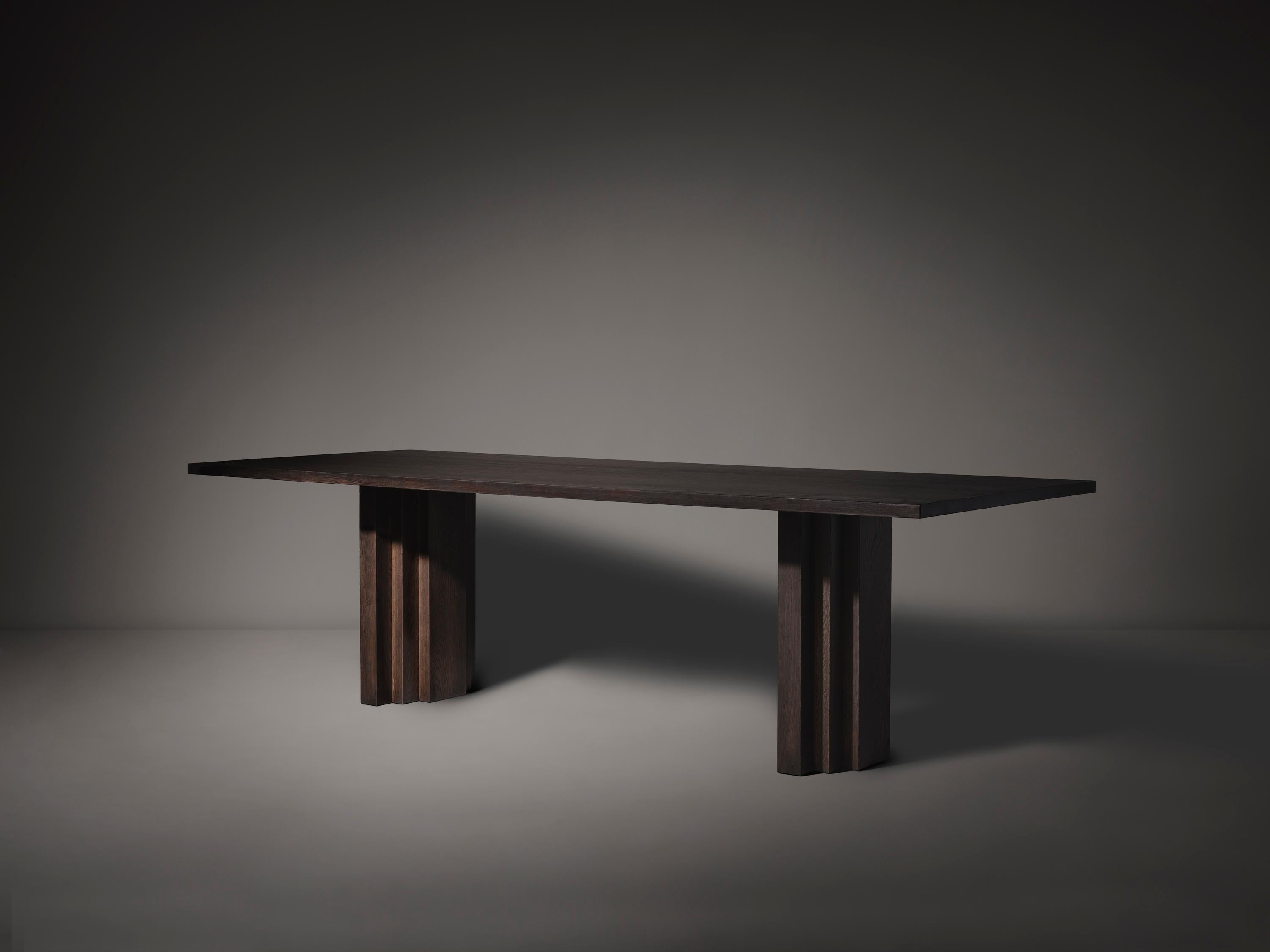 https://a.1stdibscdn.com/large-mokko-dining-table-in-solid-french-oak-for-sale-picture-2/f_89302/f_429557821735655181616/Brut_Slim_Table_Dark_Brown_I_Oak_Perspective_View_photo_by_Thomas_van_Schaik_master.jpg