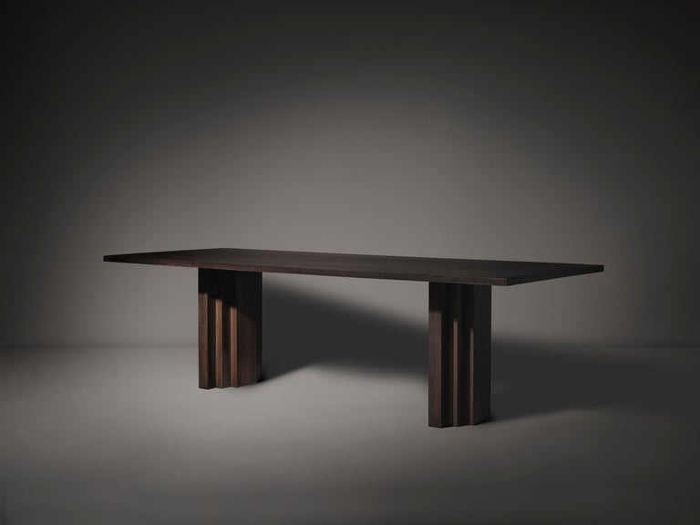 https://a.1stdibscdn.com/minimalist-solid-oak-wooden-brut-slim-dining-table-for-sale-picture-6/f_89302/f_352861721726488136069/Brut_Slim_Table_Dark_Brown_I_Oak_Perspective_View_photo_by_Thomas_van_Schaik_master.jpg?width=768