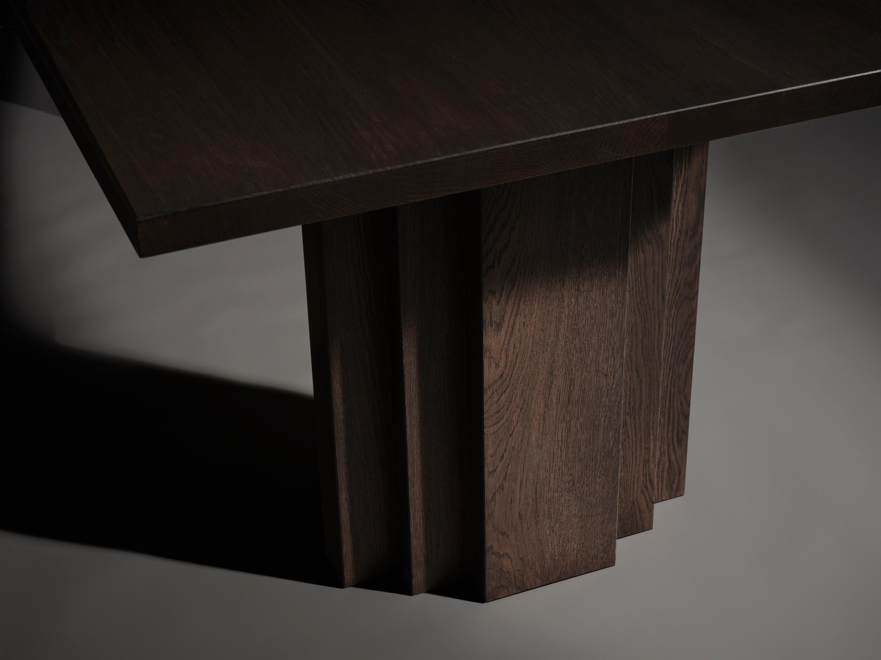 https://a.1stdibscdn.com/large-mokko-dining-table-in-solid-french-oak-for-sale-picture-4/f_89302/f_429557821735654912926/Brut_Slim_Table_Dark_Brown_Leg_Detail_photo_by_Thomas_van_Schaik_master.jpg