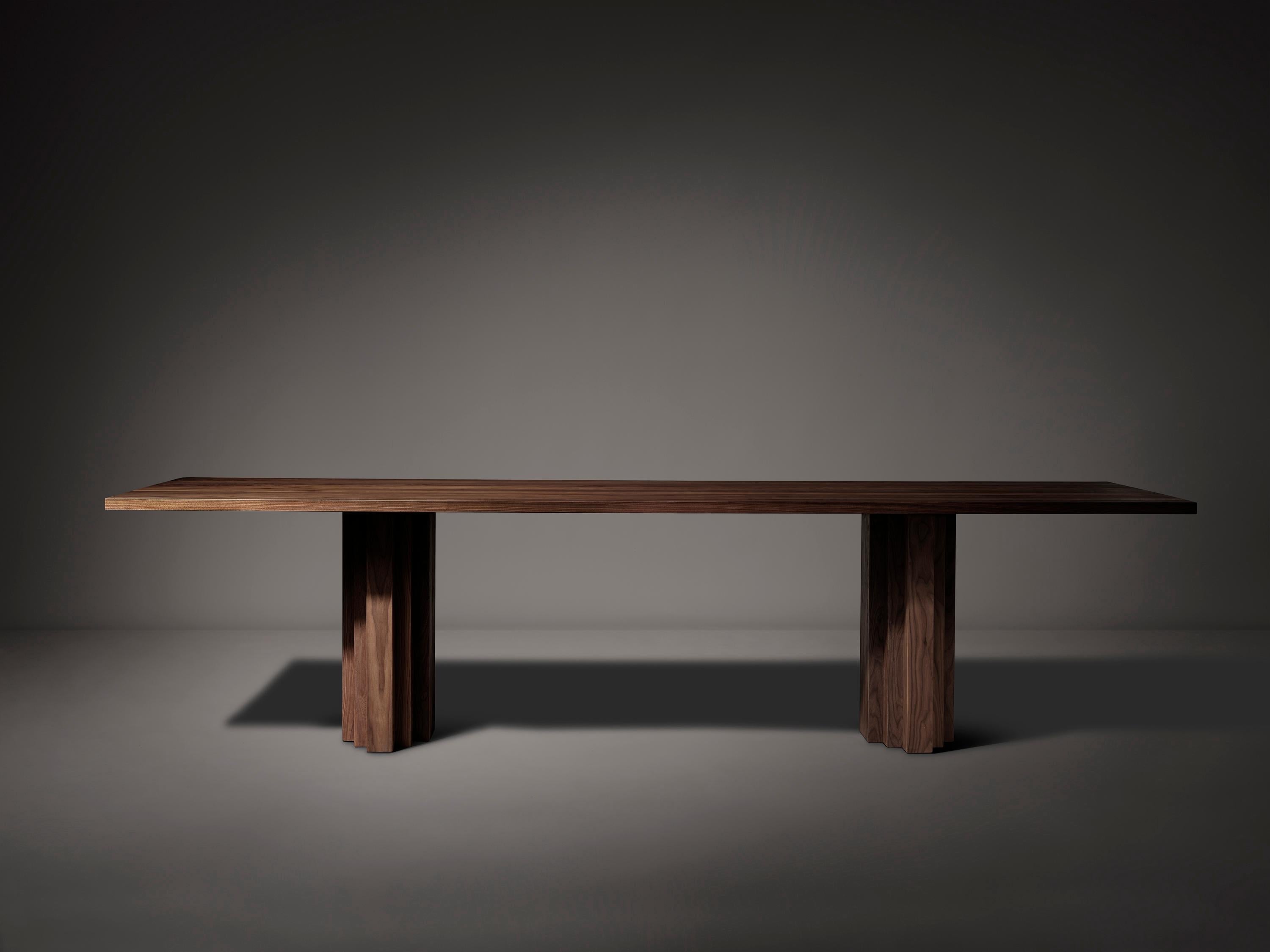 https://a.1stdibscdn.com/brut-slim-240-american-walnut-rectangular-dining-table-by-mokko-amsterdam-for-sale-picture-2/f_12192/f_452826021748882002475/Brut_Slim_Table_Walnut_front_view_photo_by_Thomas_van_Schaik_master.jpg