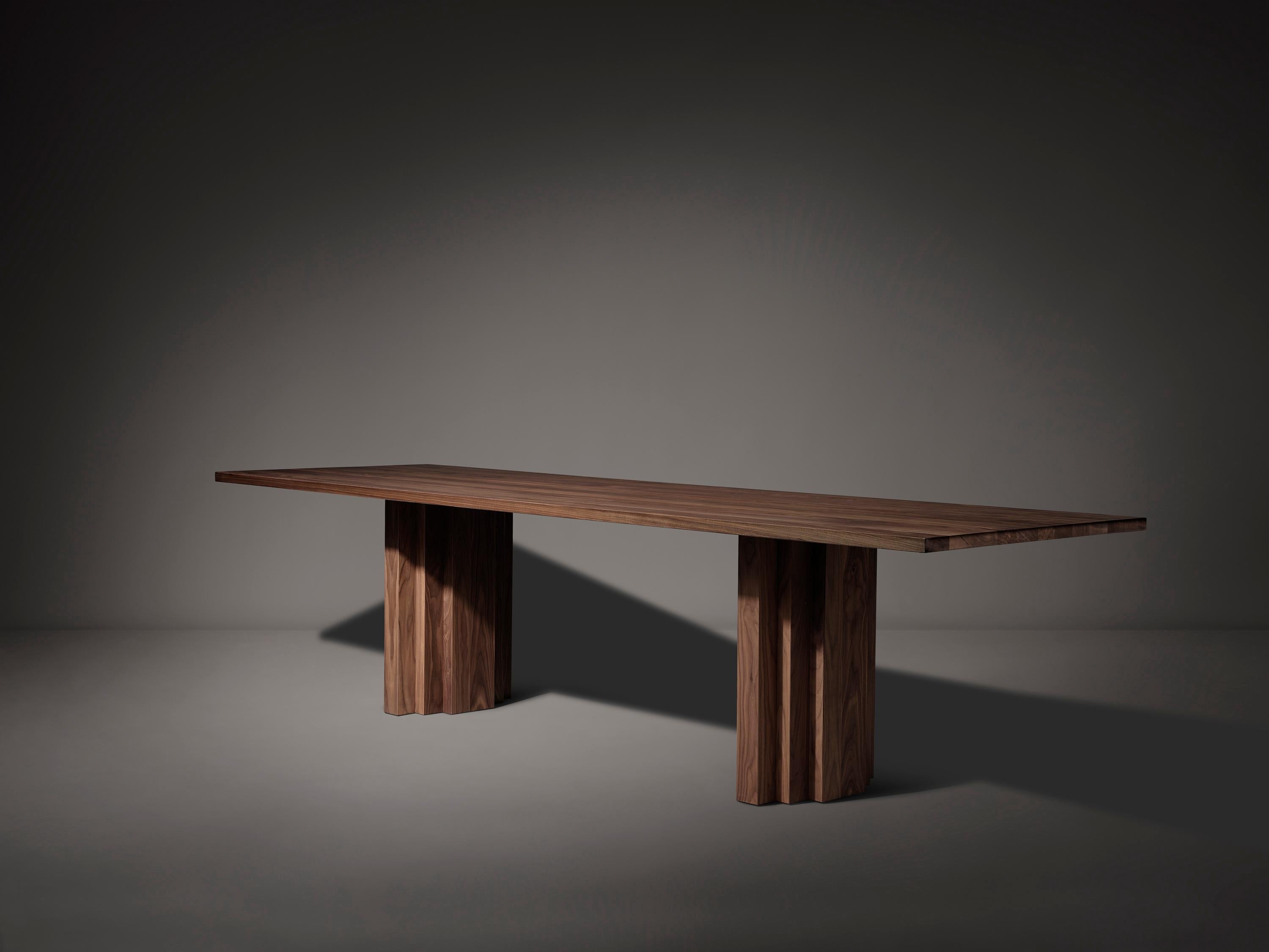 https://a.1stdibscdn.com/large-mokko-dining-table-in-solid-french-oak-for-sale-picture-9/f_89302/f_429557821735654916447/Brut_Slim_Table_Walnut_perspective_view_photo_by_Thomas_van_Schaik_master.jpg