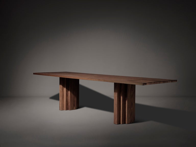 https://a.1stdibscdn.com/minimalist-solid-oak-wooden-brut-slim-dining-table-for-sale-picture-9/f_89302/f_352861721726488136495/Brut_Slim_Table_Walnut_perspective_view_photo_by_Thomas_van_Schaik_master.jpg?width=768