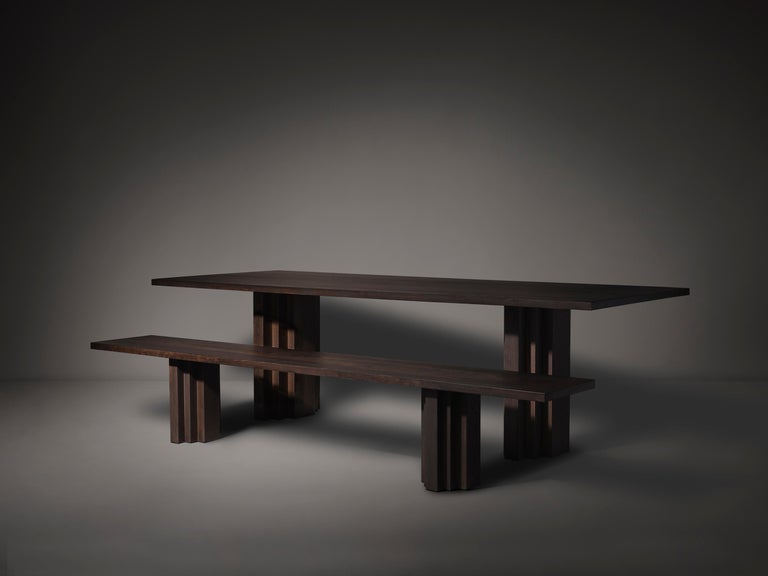 https://a.1stdibscdn.com/minimalist-solid-oak-wooden-brut-slim-dining-table-for-sale-picture-11/f_89302/f_352861721726488138234/Brut_Slim_Table_and_Brut_Slim_Bench_Dark_Brown_I_Oak_Perspective_View_photo_by_Thomas_van_Schaik_master.jpg?width=768