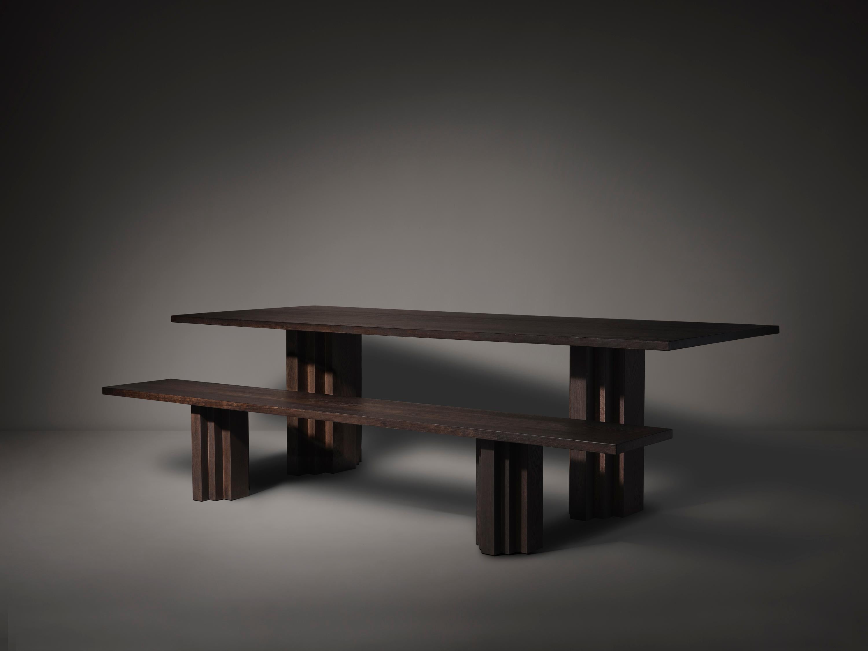 https://a.1stdibscdn.com/large-mokko-dining-table-in-solid-french-oak-for-sale-picture-5/f_89302/f_429557821735654913723/Brut_Slim_and_Bench_Dark_Brown_Perspective_View_photo_by_Thomas_van_Schaik_master.jpg