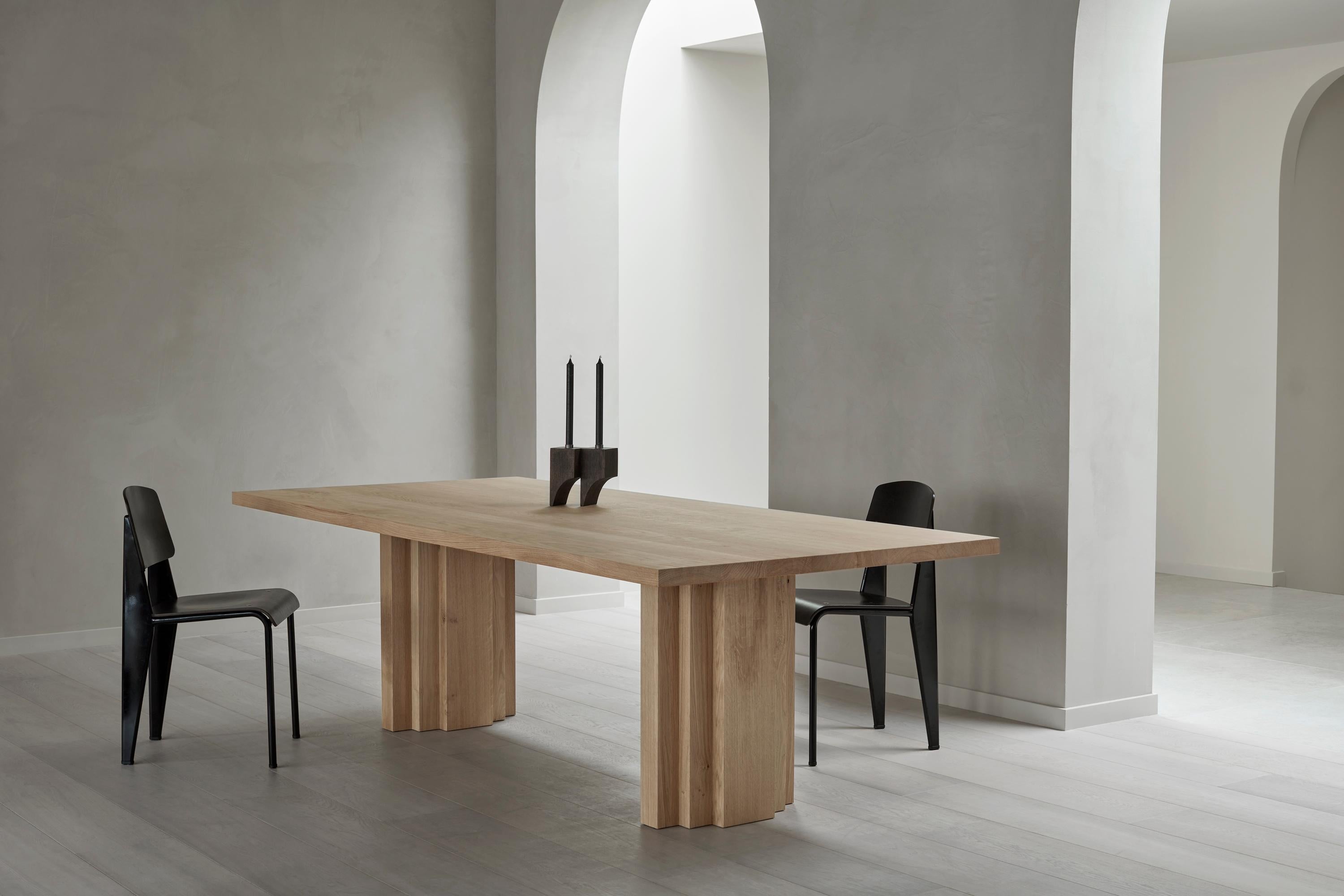 https://a.1stdibscdn.com/dining-table-sculptural-design-solid-natural-light-oak-brut-slim-by-mokko-for-sale-picture-2/f_89302/f_490451121772465543345/Brut_Slim_eiken_Natural_setting_Achtergracht_Credit_Thomas_van_Schaik_master.jpg