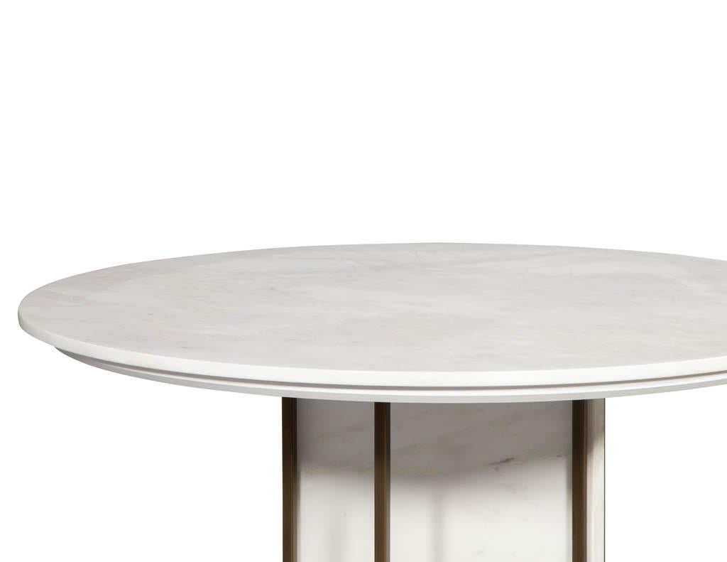 https://a.1stdibscdn.com/custom-modern-round-marble-top-dining-table-with-brass-detailing-for-sale-picture-8/f_8849/f_254206821632339505913/CE_3300_Custom_Round_Modern_Marble_Table_008_master.jpg