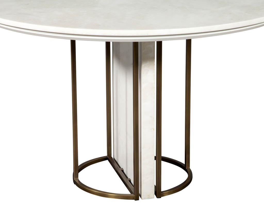 https://a.1stdibscdn.com/custom-modern-round-marble-top-dining-table-with-brass-detailing-for-sale-picture-9/f_8849/f_254206821632339506090/CE_3300_Custom_Round_Modern_Marble_Table_009_master.jpg