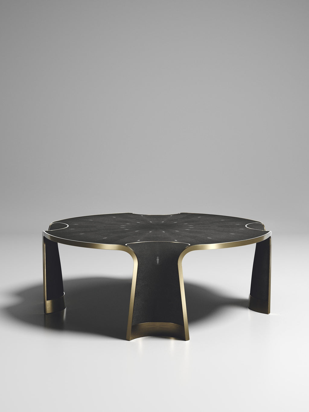 https://a.1stdibscdn.com/shagreen-coffee-table-with-bronze-patina-brass-inlay-by-ry-augousti-for-sale-picture-9/f_45491/f_338632321681813638630/CF53_NIINPHEA_D156_10000_1__master.jpg