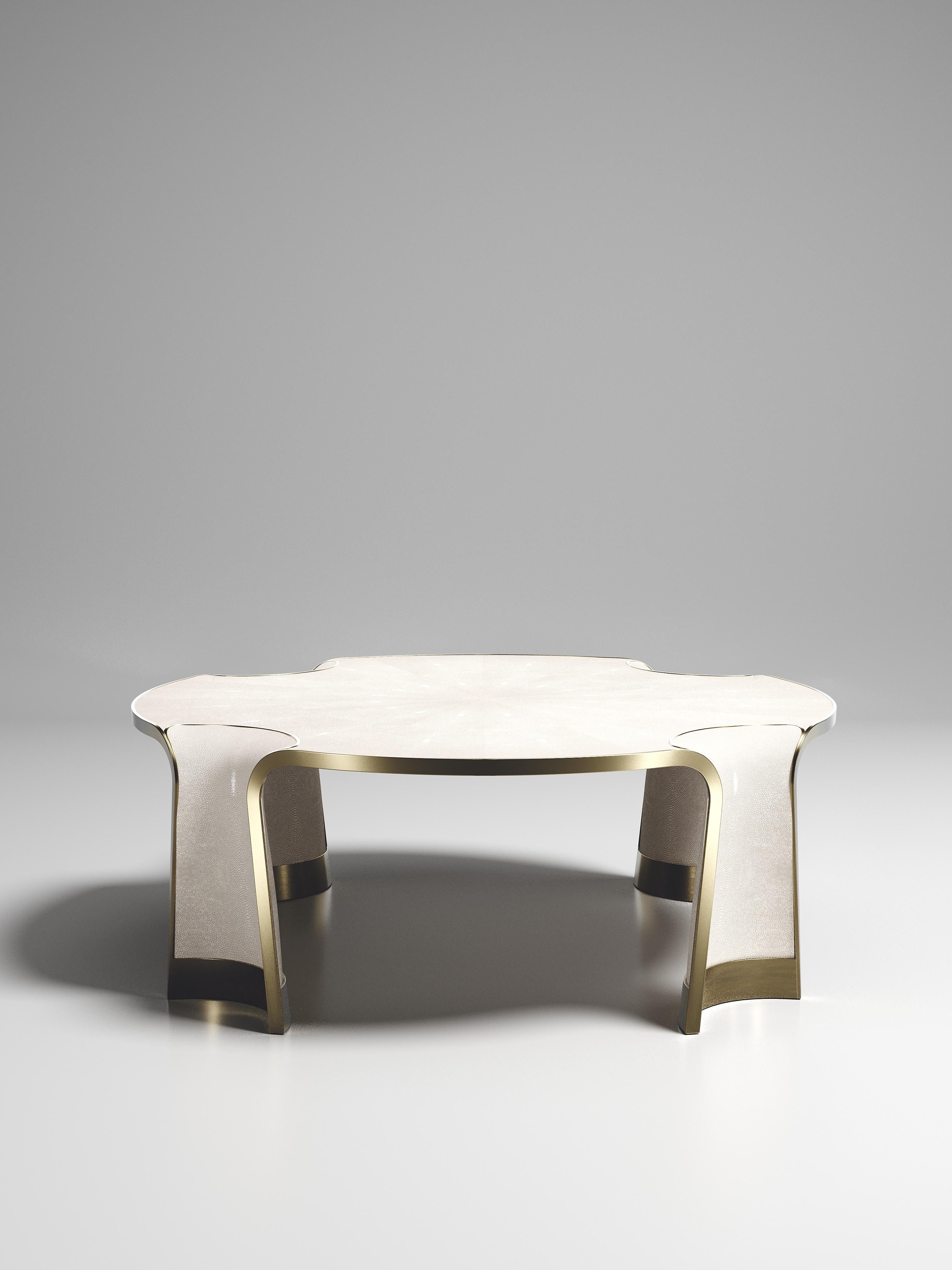 https://a.1stdibscdn.com/shagreen-coffee-table-with-bronze-patina-brass-inlay-by-ry-augousti-for-sale-picture-3/f_45491/f_338632321681813566657/CF53_NIINPHEA_D1_2__master.jpg