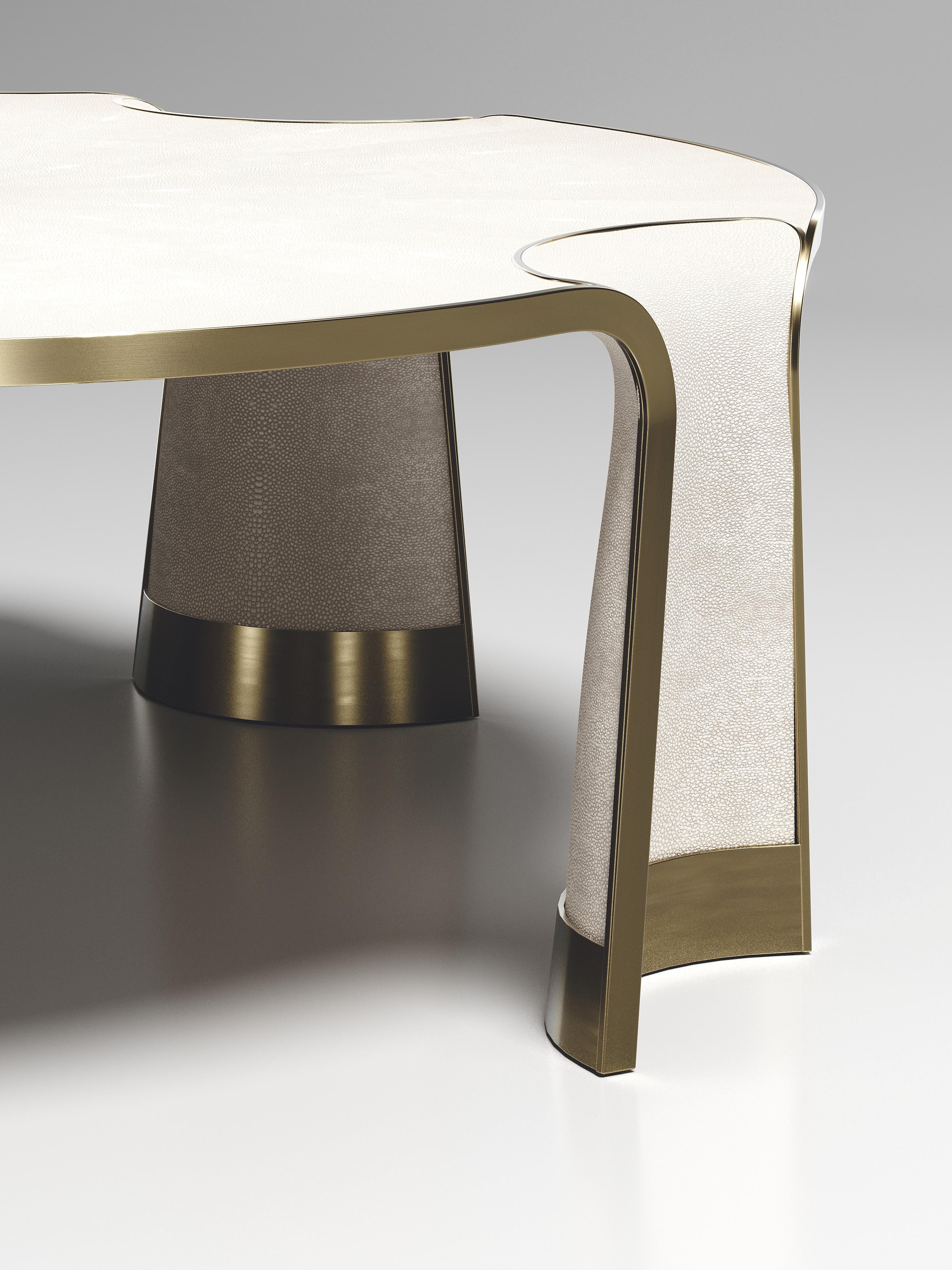 https://a.1stdibscdn.com/shagreen-coffee-table-with-bronze-patina-brass-inlay-by-ry-augousti-for-sale-picture-4/f_45491/f_338632321681813567019/CF53_NIINPHEA_D1_7__master.jpg