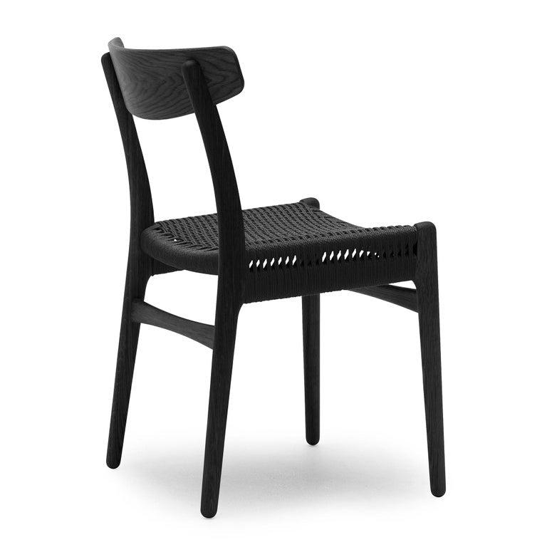 https://a.1stdibscdn.com/hans-wegner-ch23-chair-in-black-oak-black-papercord-for-carl-hansen-son-for-sale-picture-2/f_14472/f_412966721725206570119/CH23_oak_black_papercord_black_back_master.jpeg?width=768