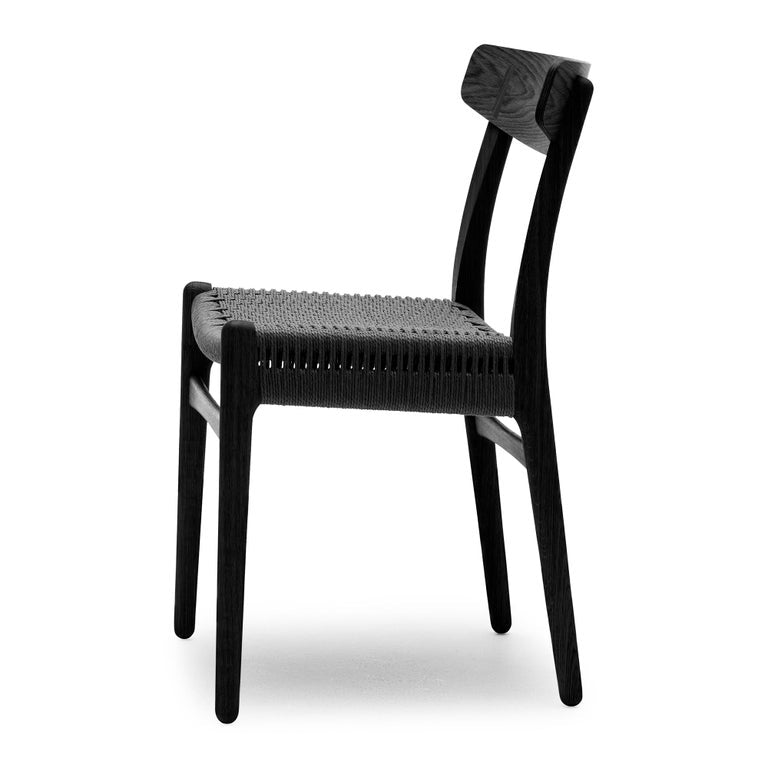 https://a.1stdibscdn.com/hans-wegner-ch23-chair-in-black-oak-black-papercord-for-carl-hansen-son-for-sale-picture-3/f_14472/f_412966721725206570137/CH23_oak_black_papercord_black_side_master.jpeg?width=768