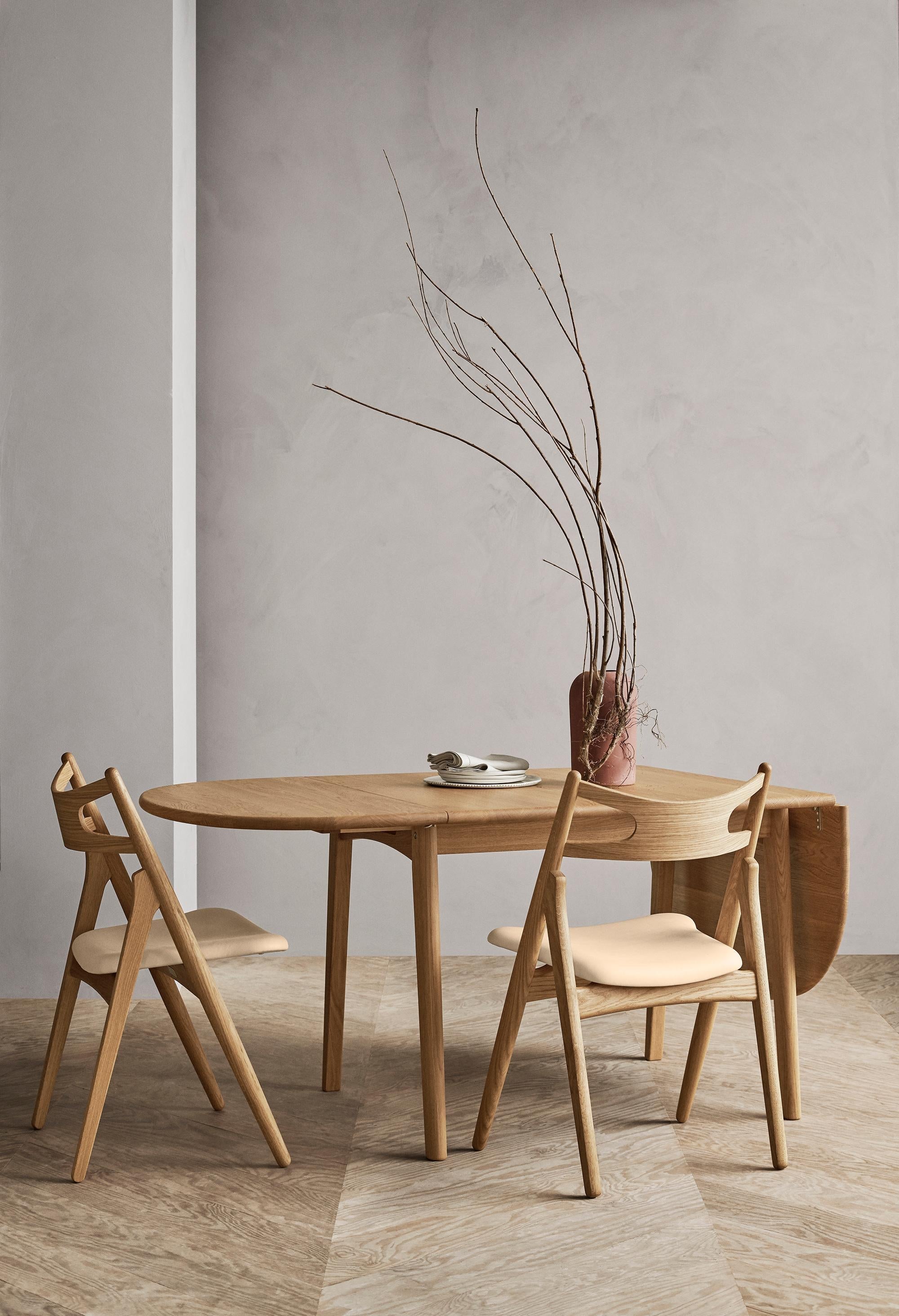 https://a.1stdibscdn.com/hans-j-wegner-ch002-dining-table-in-oak-oil-for-carl-hansen-son-for-sale-picture-5/f_14472/f_413300121725464006834/CH29P_oak_oil_sif90_CH002_oak_oil_80280012_master.jpg