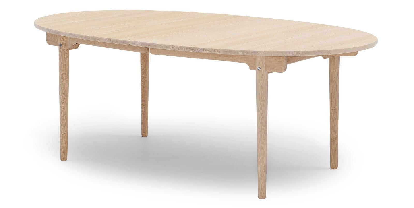 https://a.1stdibscdn.com/hans-j-wegner-ch338-dining-table-200-x-115-cm-oak-white-oil-for-carl-hansen-for-sale-picture-2/f_104122/f_476338521763659365137/CH338_oak_whiteoil_side_medium_master.jpg