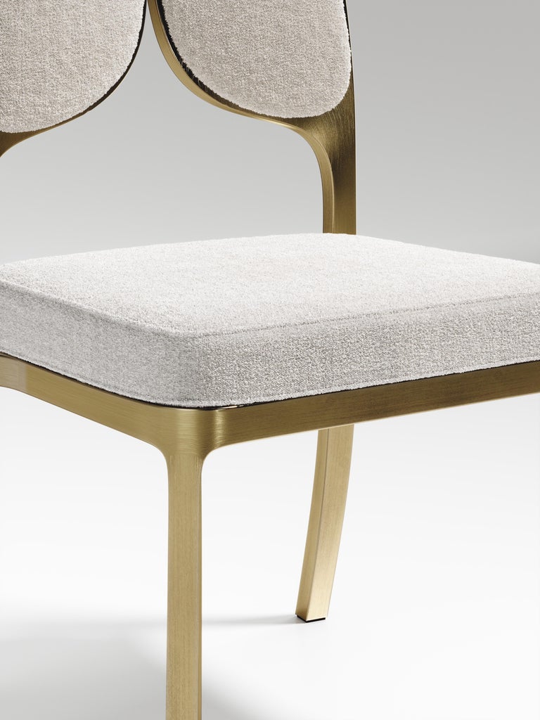 https://a.1stdibscdn.com/upholstered-dining-chair-with-bronze-patina-brass-details-by-ry-augousti-for-sale-picture-14/f_45491/f_320580421672900781193/CH38_PFC_10_master.jpg?width=768